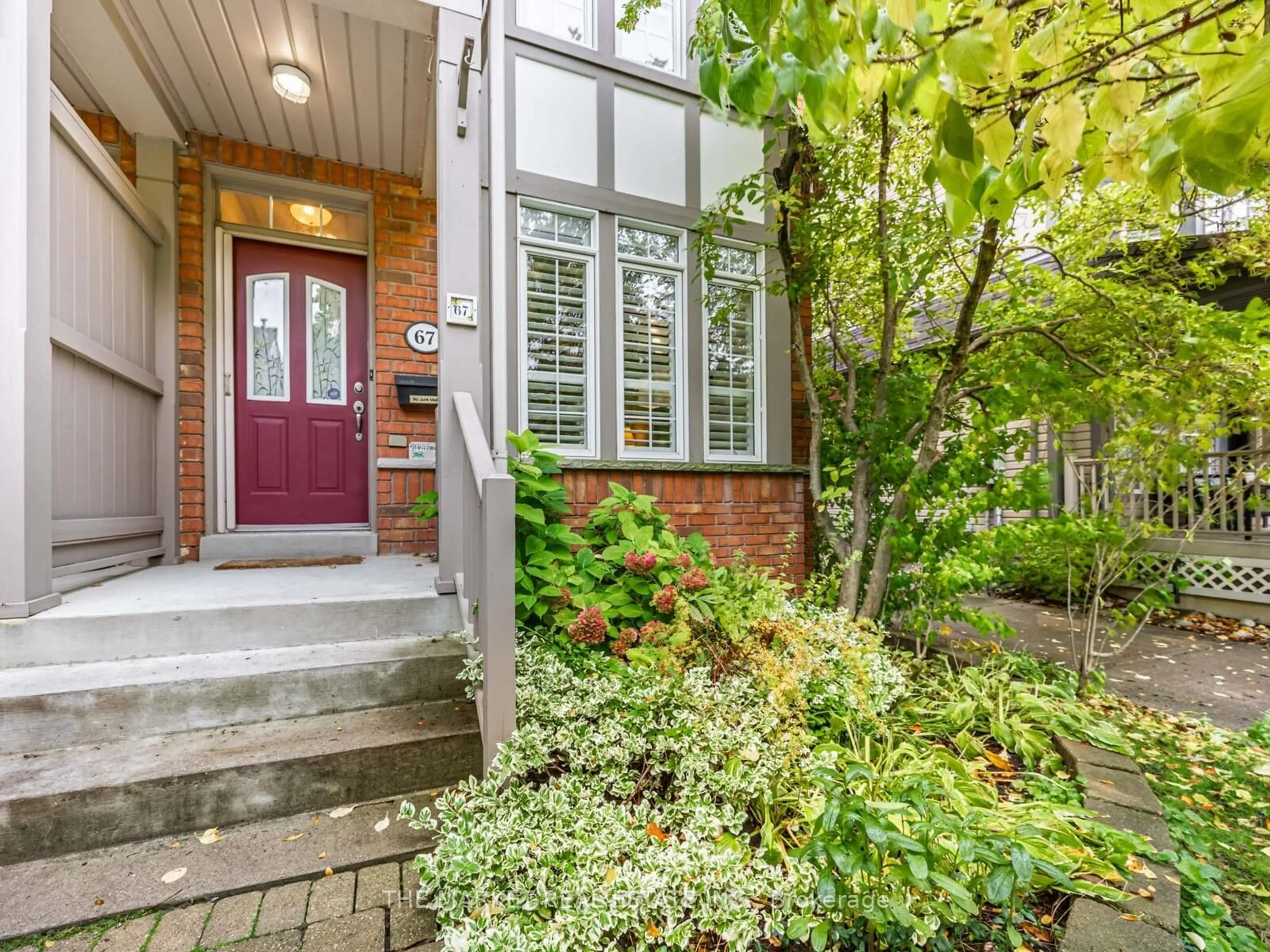 Home with brick exterior material, street for 67 Winners Circ, Toronto Ontario M4L 3Y7