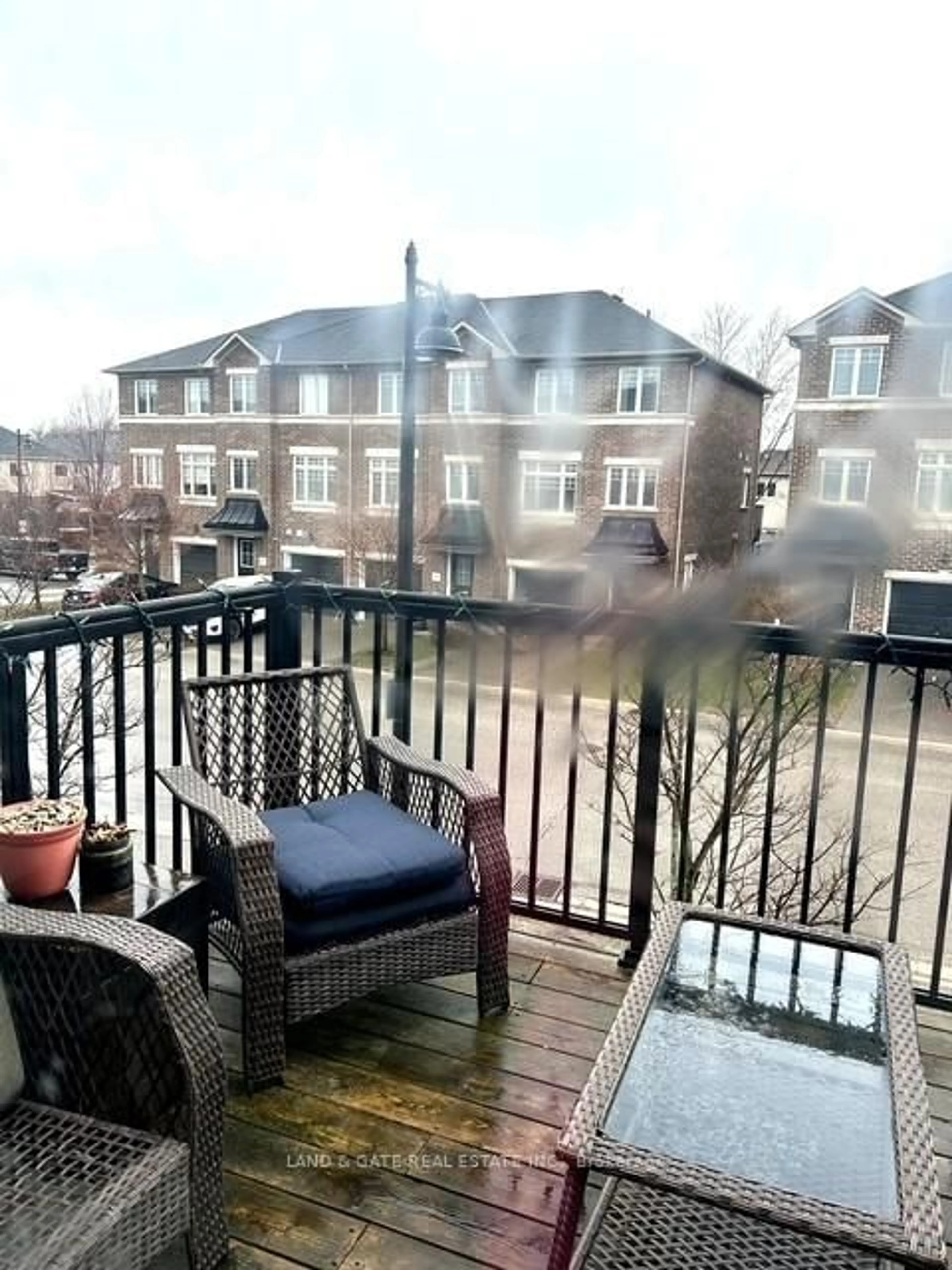 Patio, city buildings view from balcony for 466 Meadowglade Rd, Clarington Ontario L1E 2W8