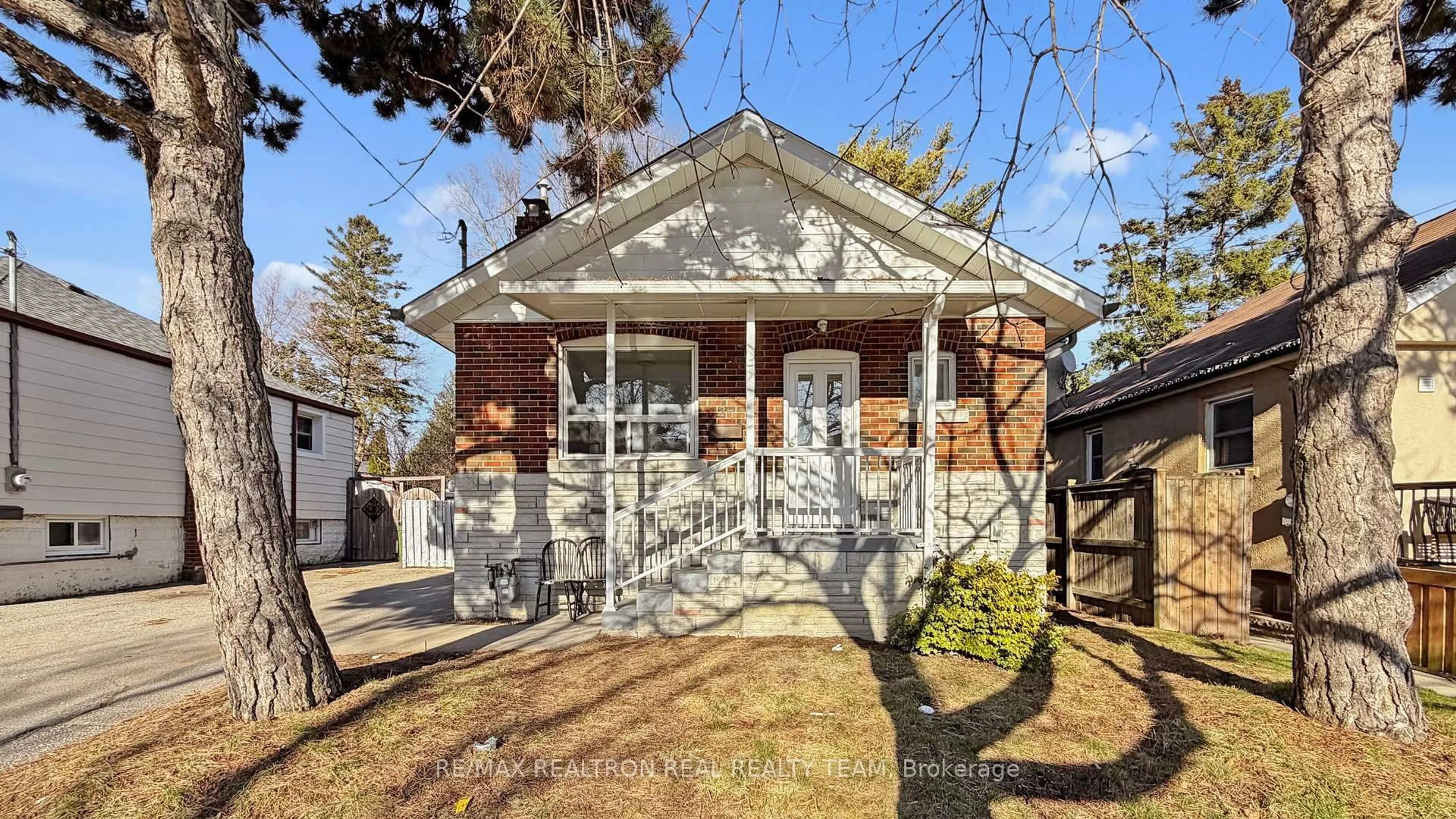 Home with brick exterior material, street for 23 Marsh Rd, Toronto Ontario M1K 1Y6