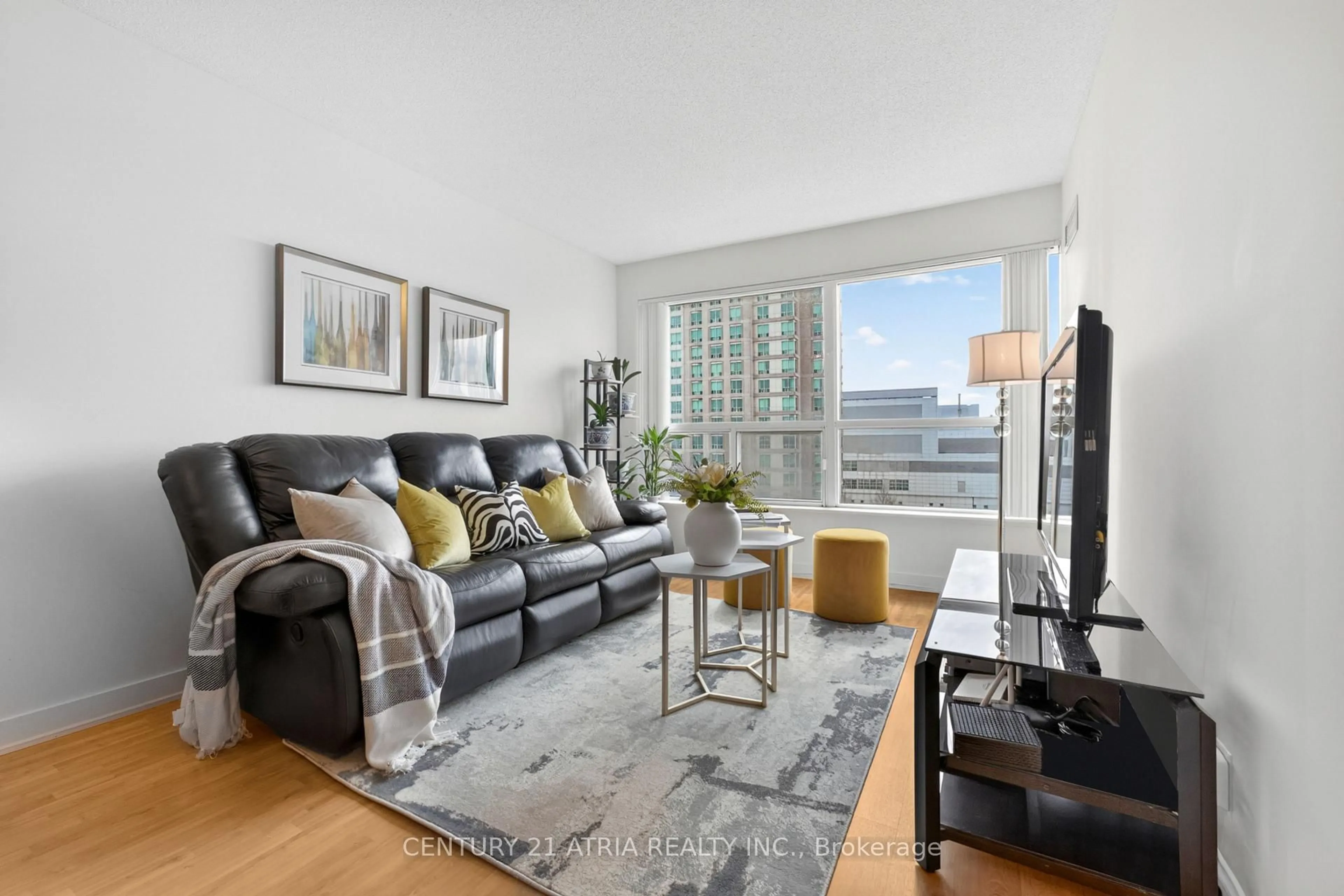 Living room with furniture, unknown for 38 Lee Centre Dr #908, Toronto Ontario M1H 3J7