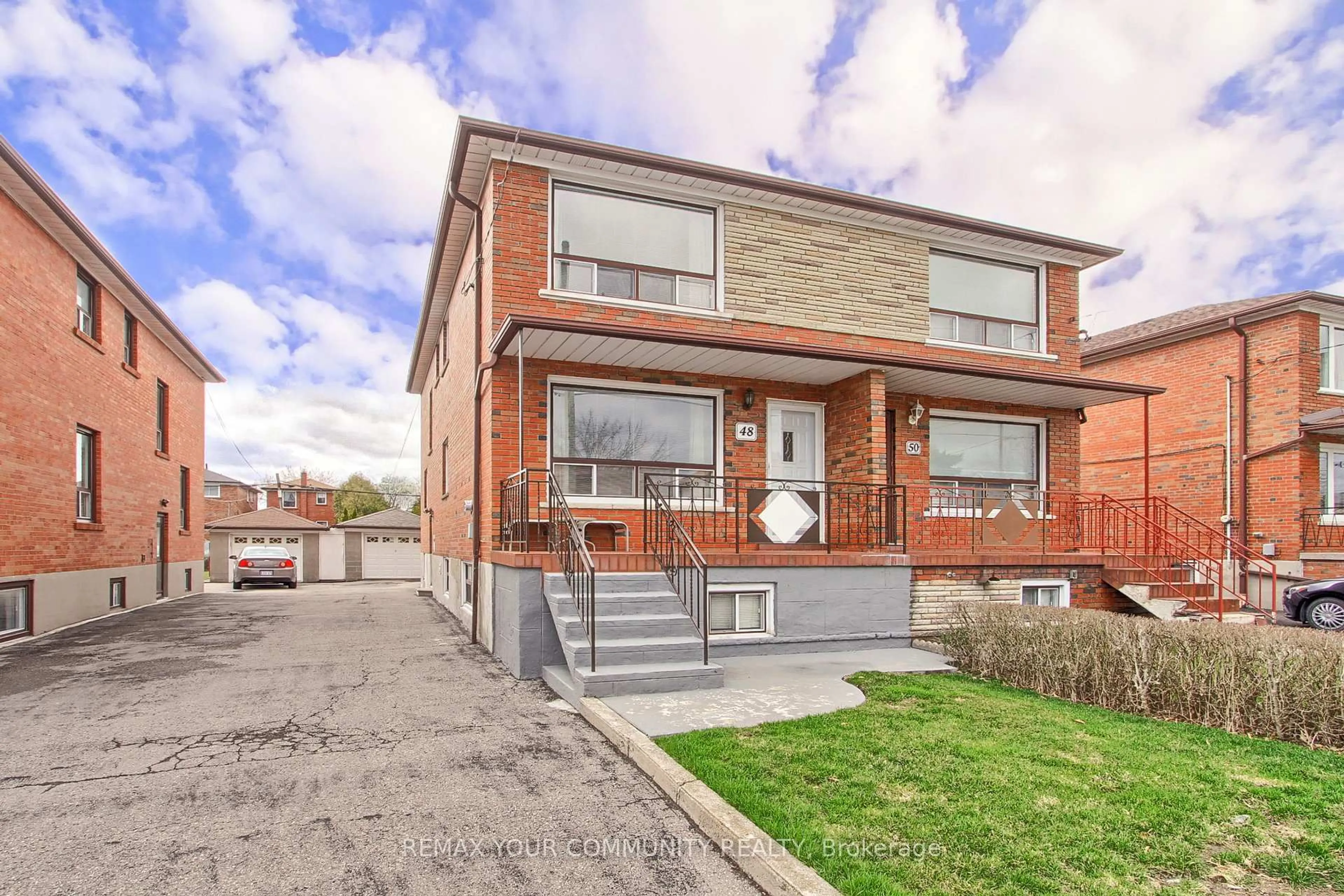 Home with brick exterior material, street for 48 North Woodrow Blvd, Toronto Ontario M1K 1W3