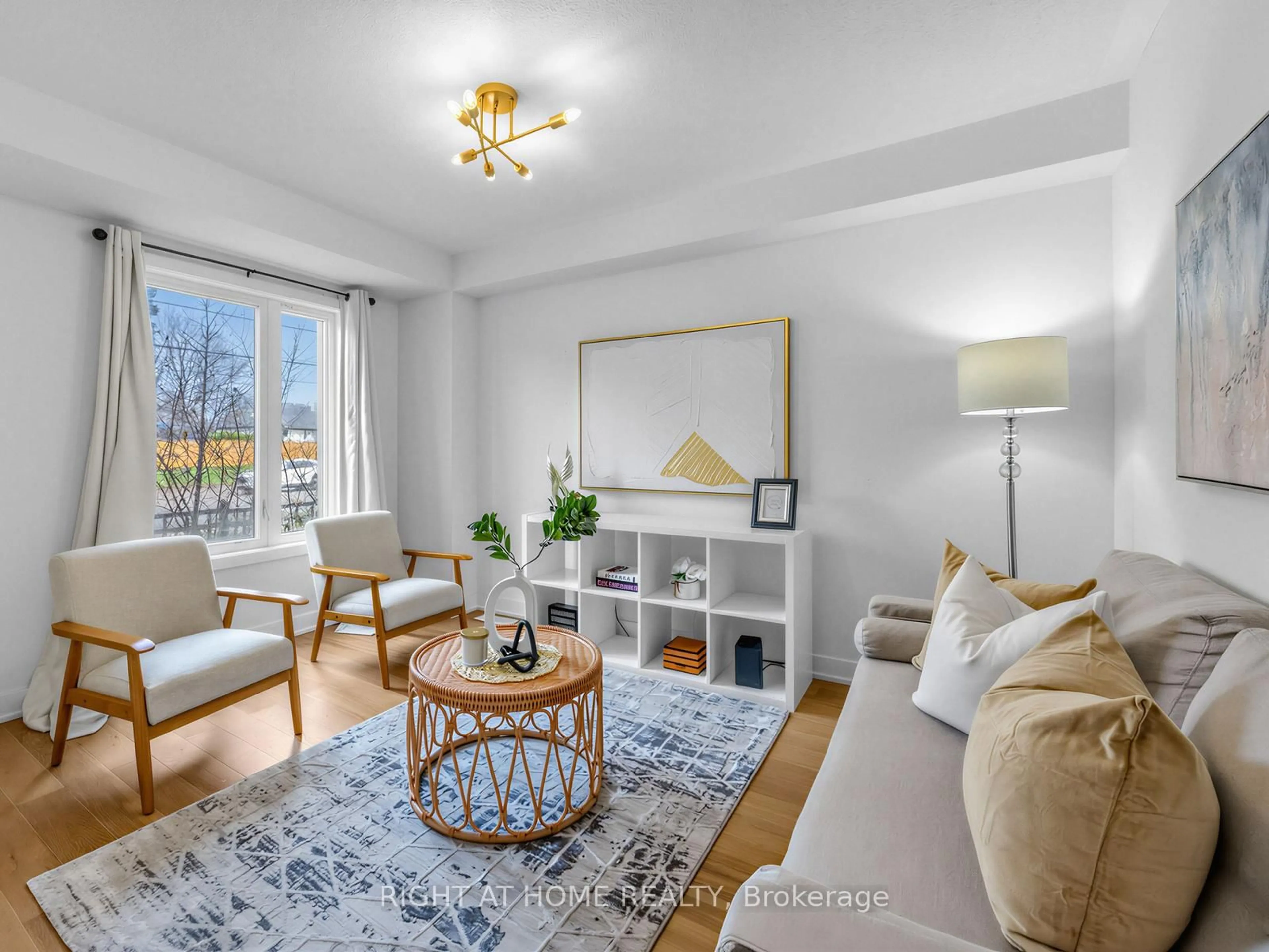 Living room with furniture, wood/laminate floor for 998 Kicking Horse Path, Oshawa Ontario L1J 0B4