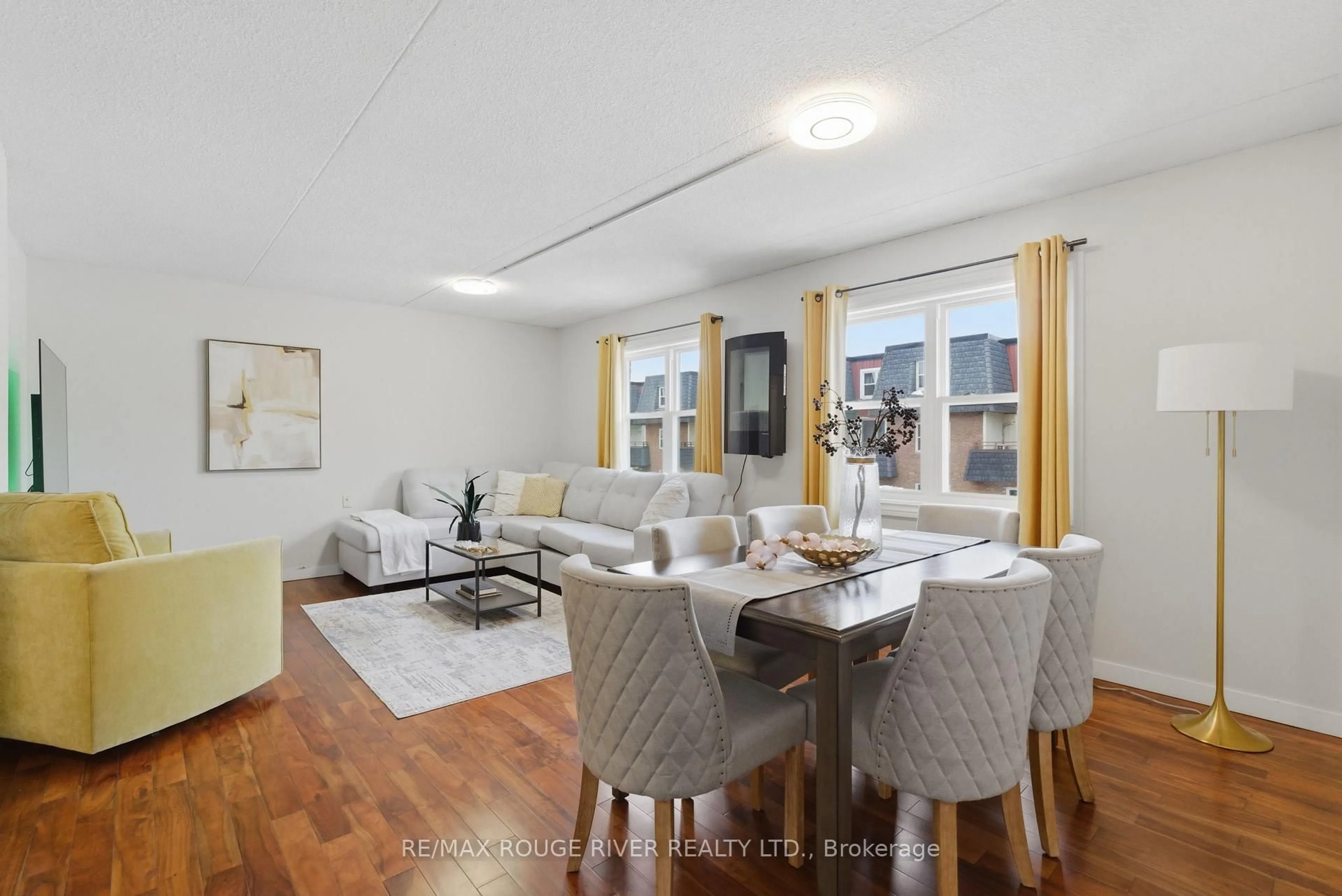 Living room with furniture, unknown for 580 Mary St #214, Whitby Ontario L1N 2R3