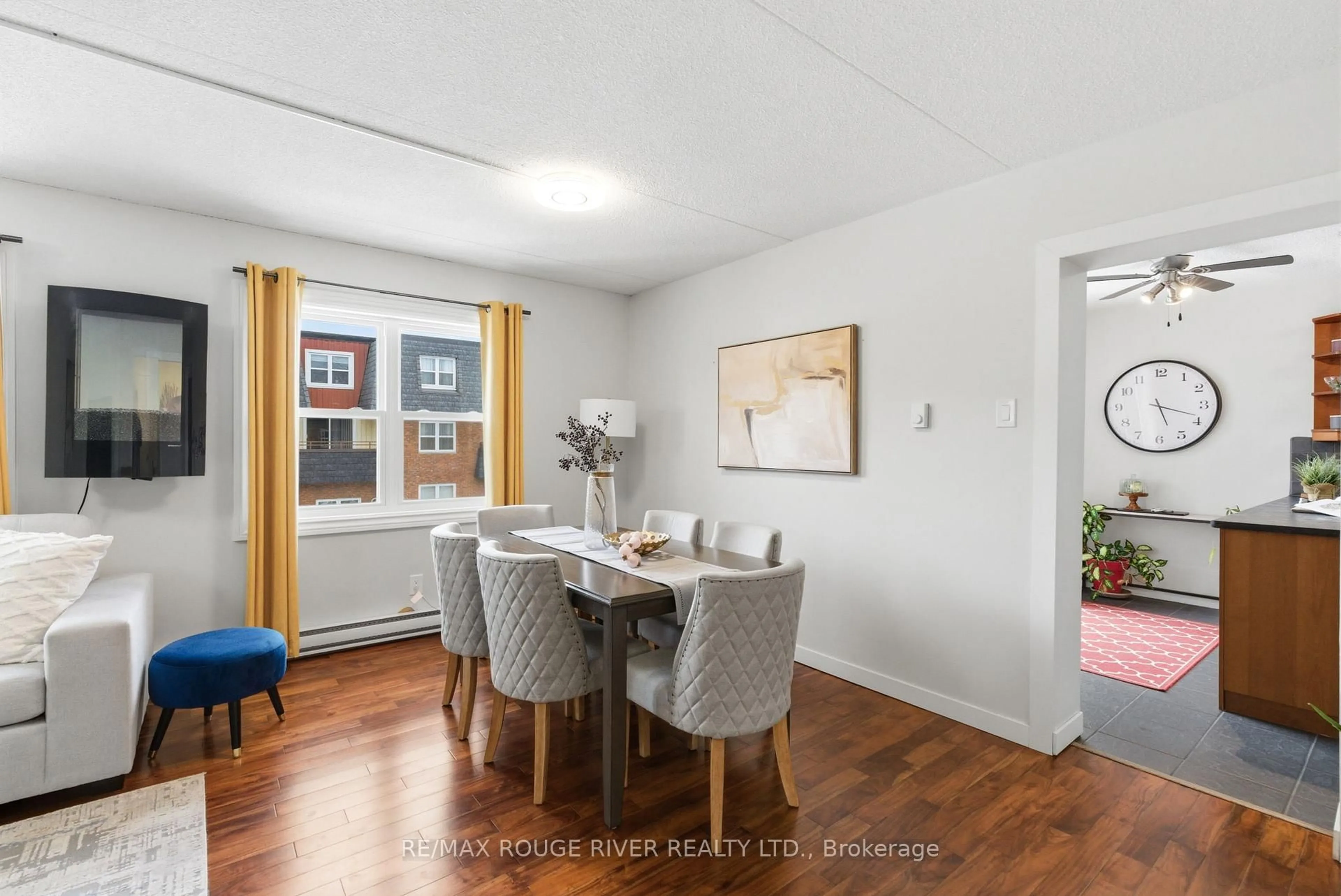 Dining room, wood/laminate floor for 580 Mary St #214, Whitby Ontario L1N 2R3