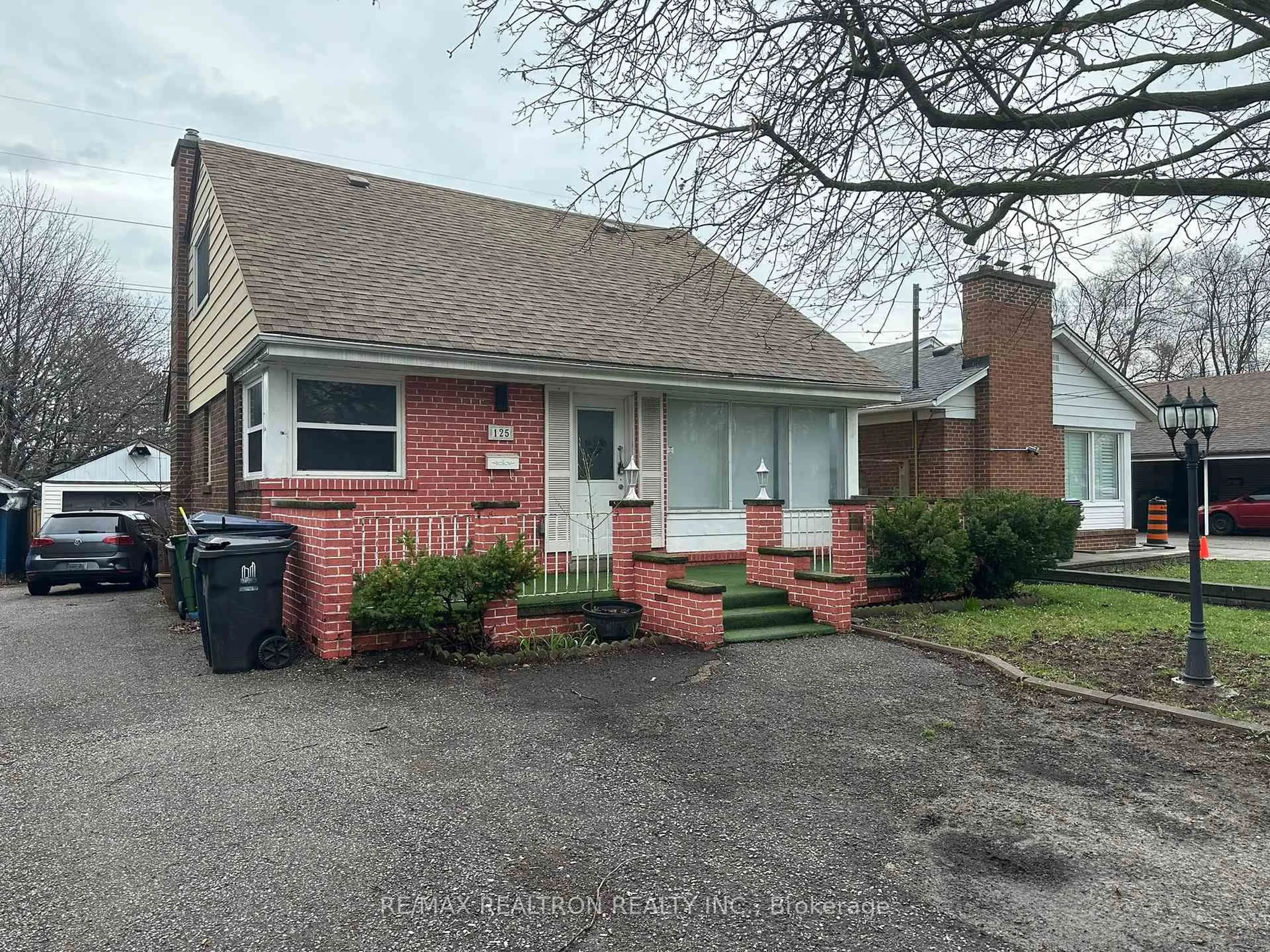 Home with brick exterior material, street for 125 Treverton Dr, Toronto Ontario M1K 3T1