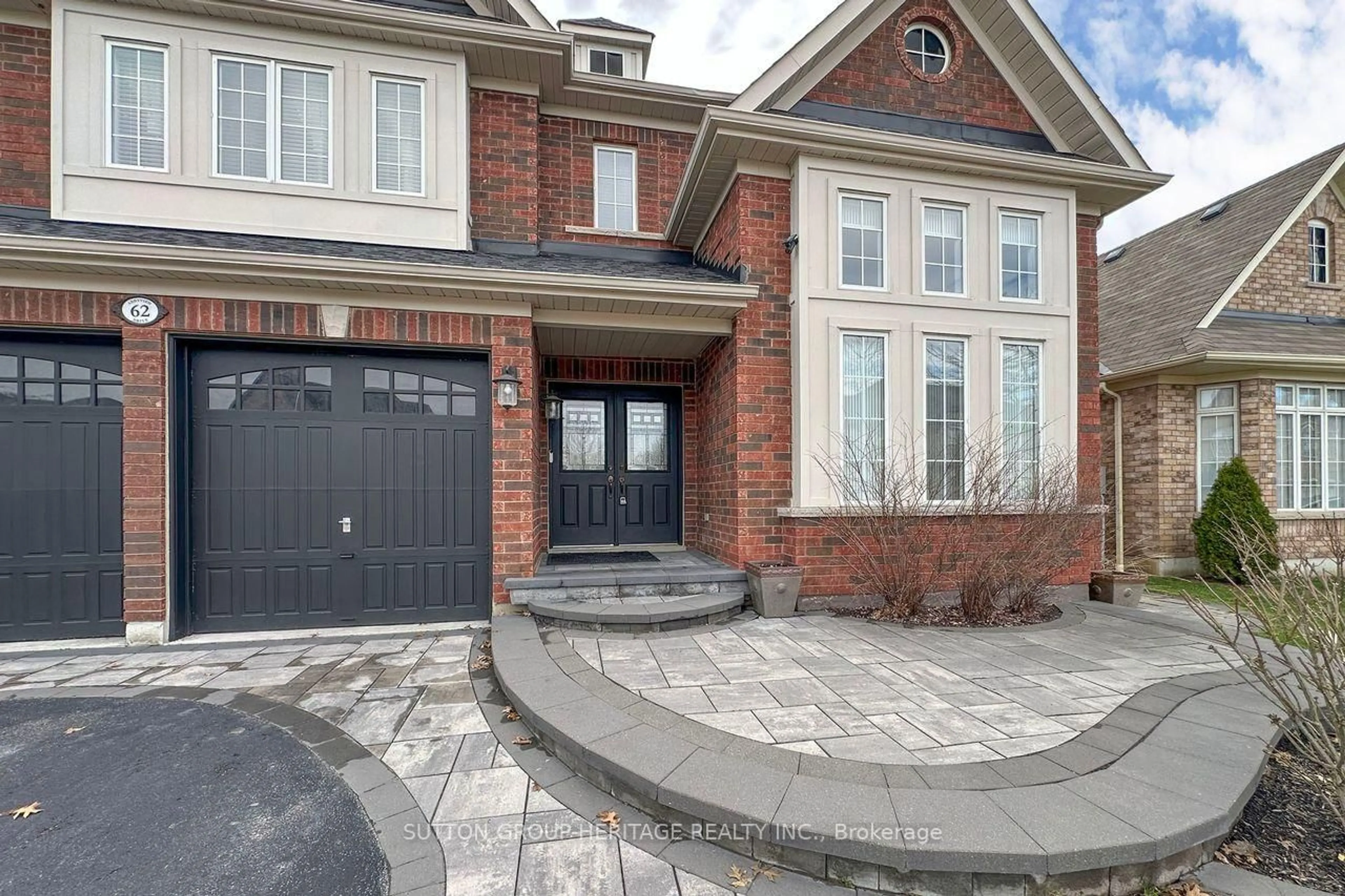 Home with brick exterior material, street for 62 Abbyview Dr, Whitby Ontario L1P 0A5