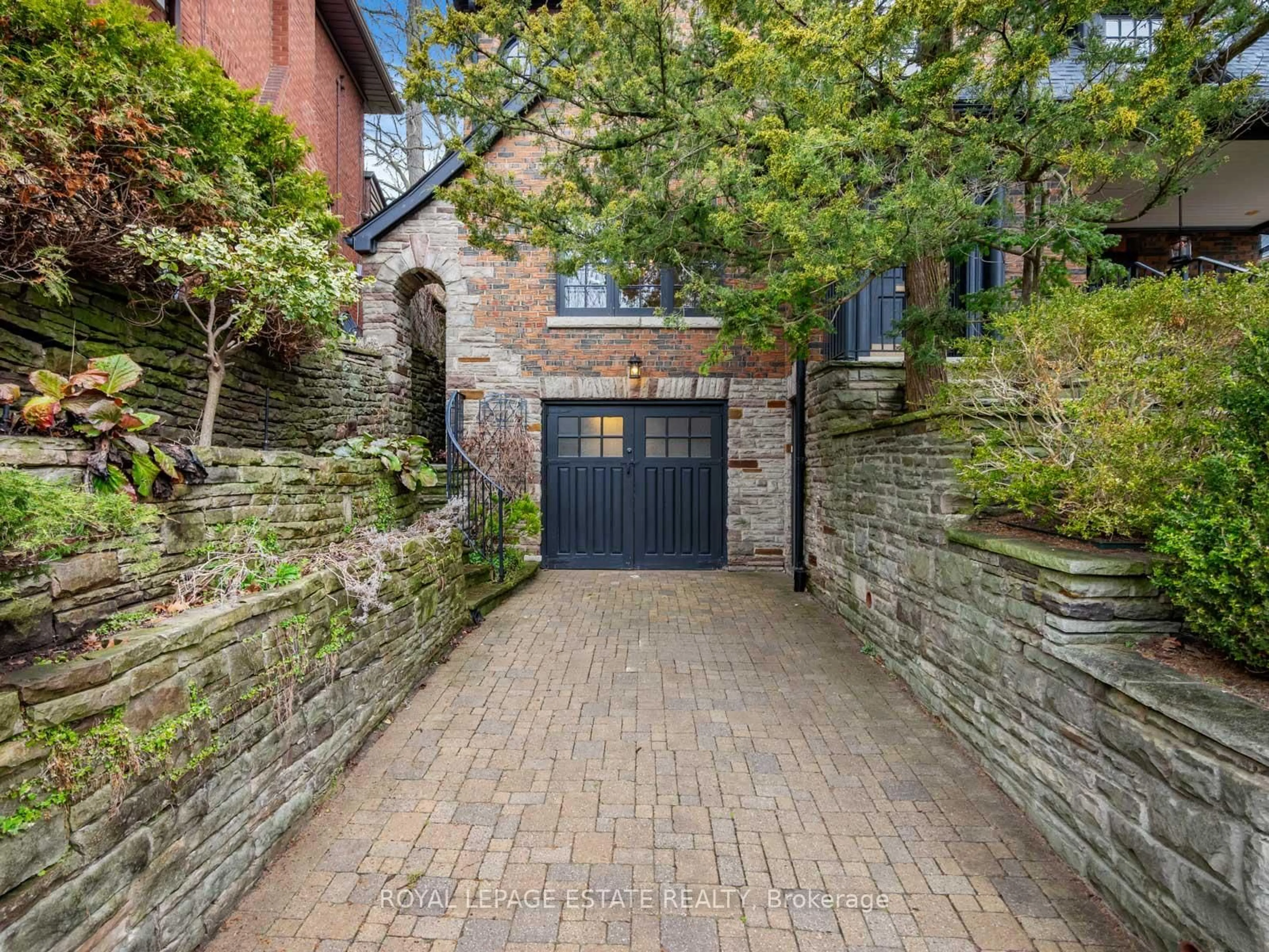 Home with brick exterior material, street for 263 Glen Manor Dr, Toronto Ontario M4E 2Y3