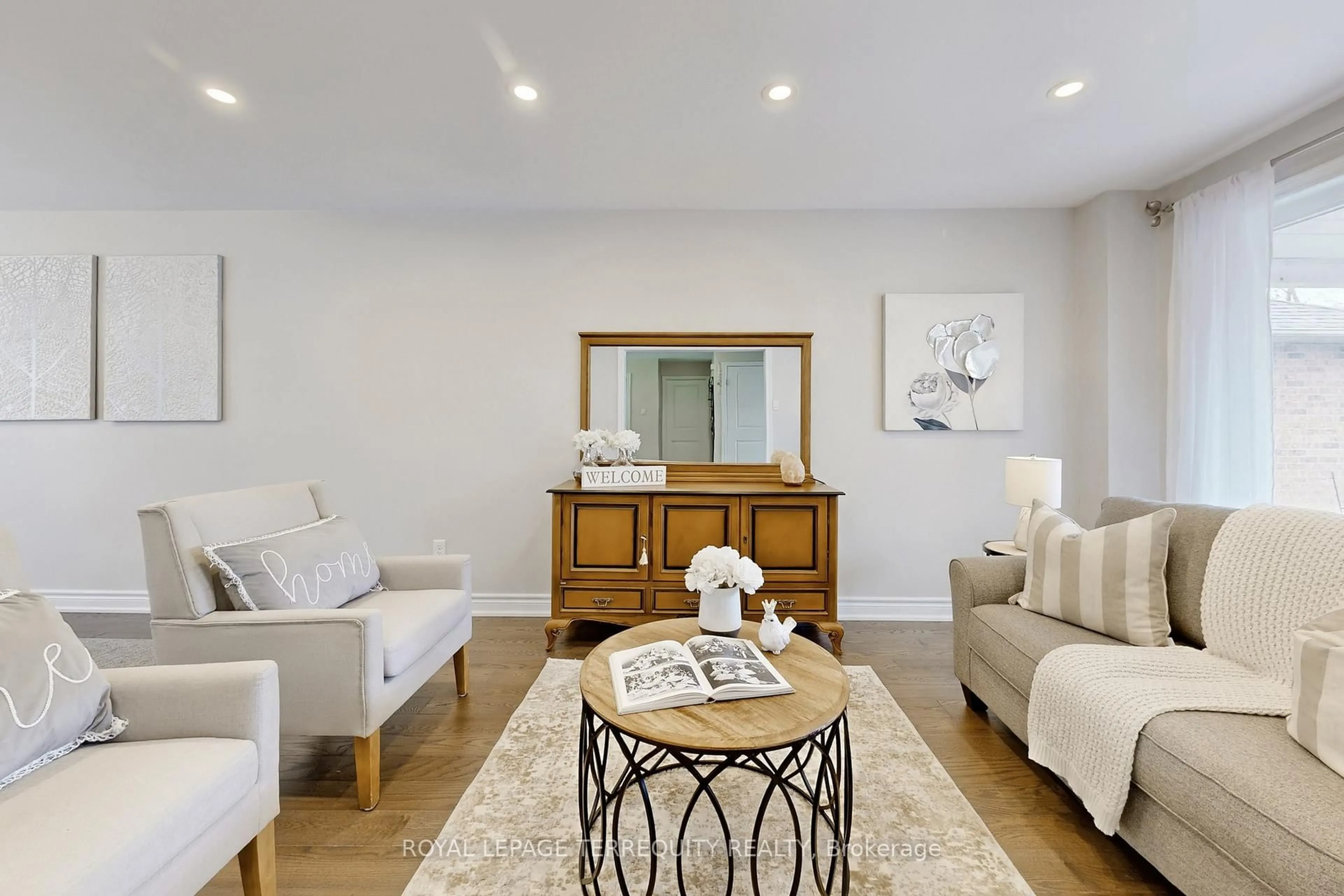 Living room with furniture, wood/laminate floor for 35 William Stephenson Dr, Whitby Ontario L1N 8J5