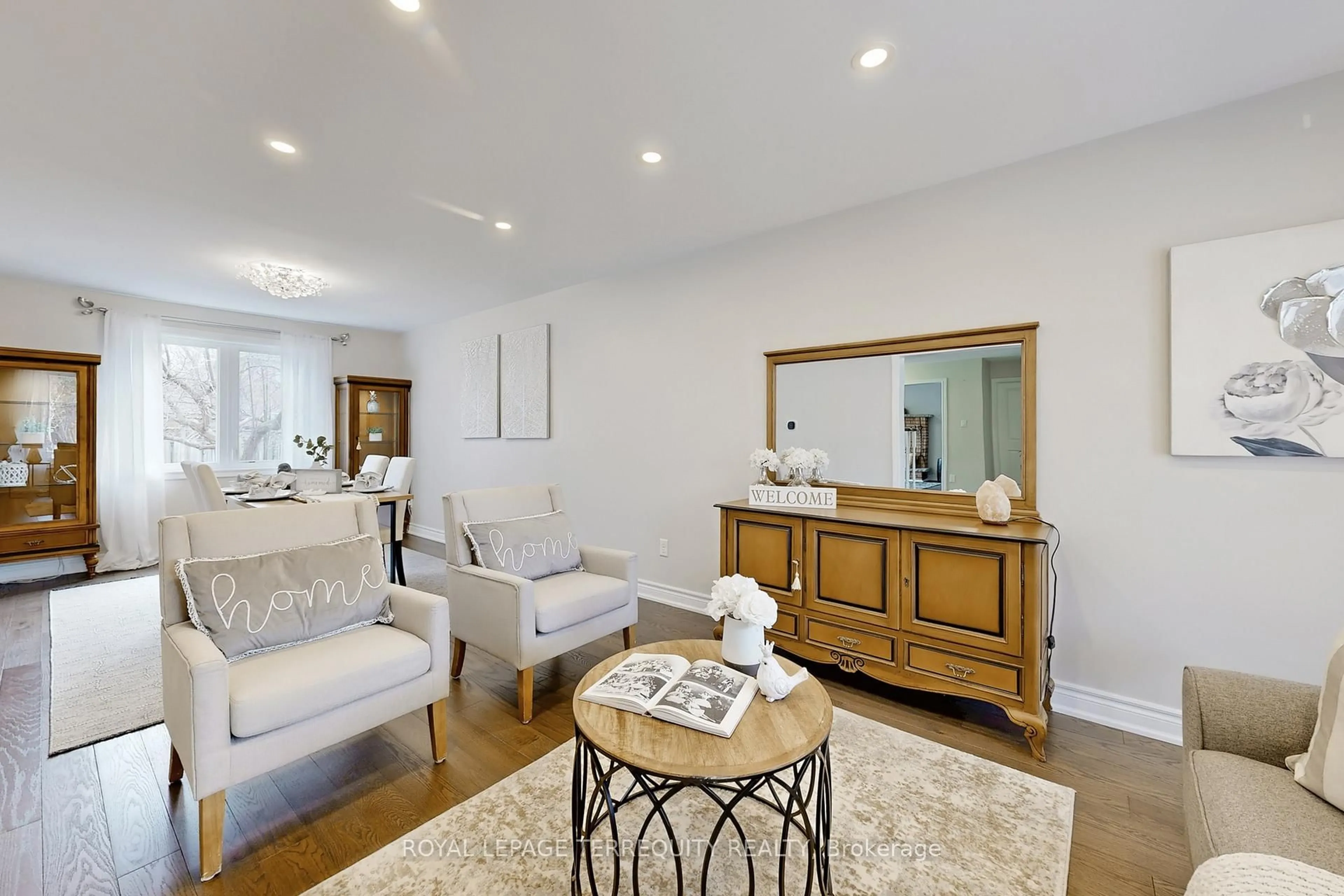 Living room with furniture, wood/laminate floor for 35 William Stephenson Dr, Whitby Ontario L1N 8J5