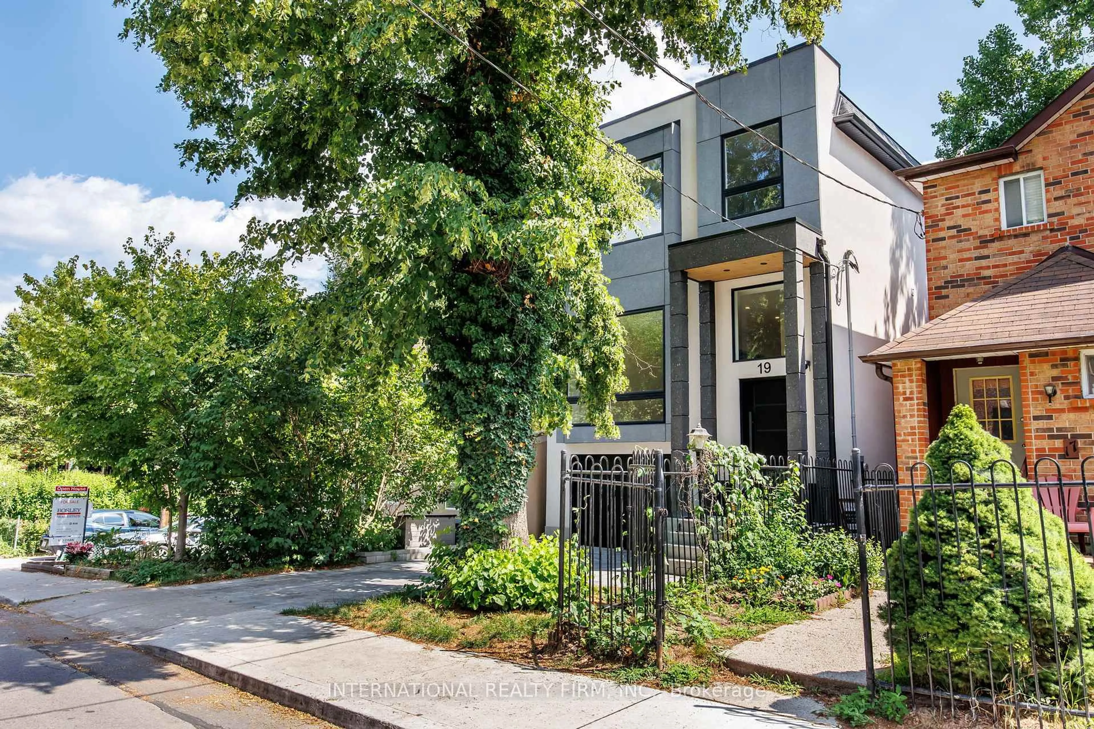 Home with brick exterior material, street for 19 Ivy Ave, Toronto Ontario M4L 2H6