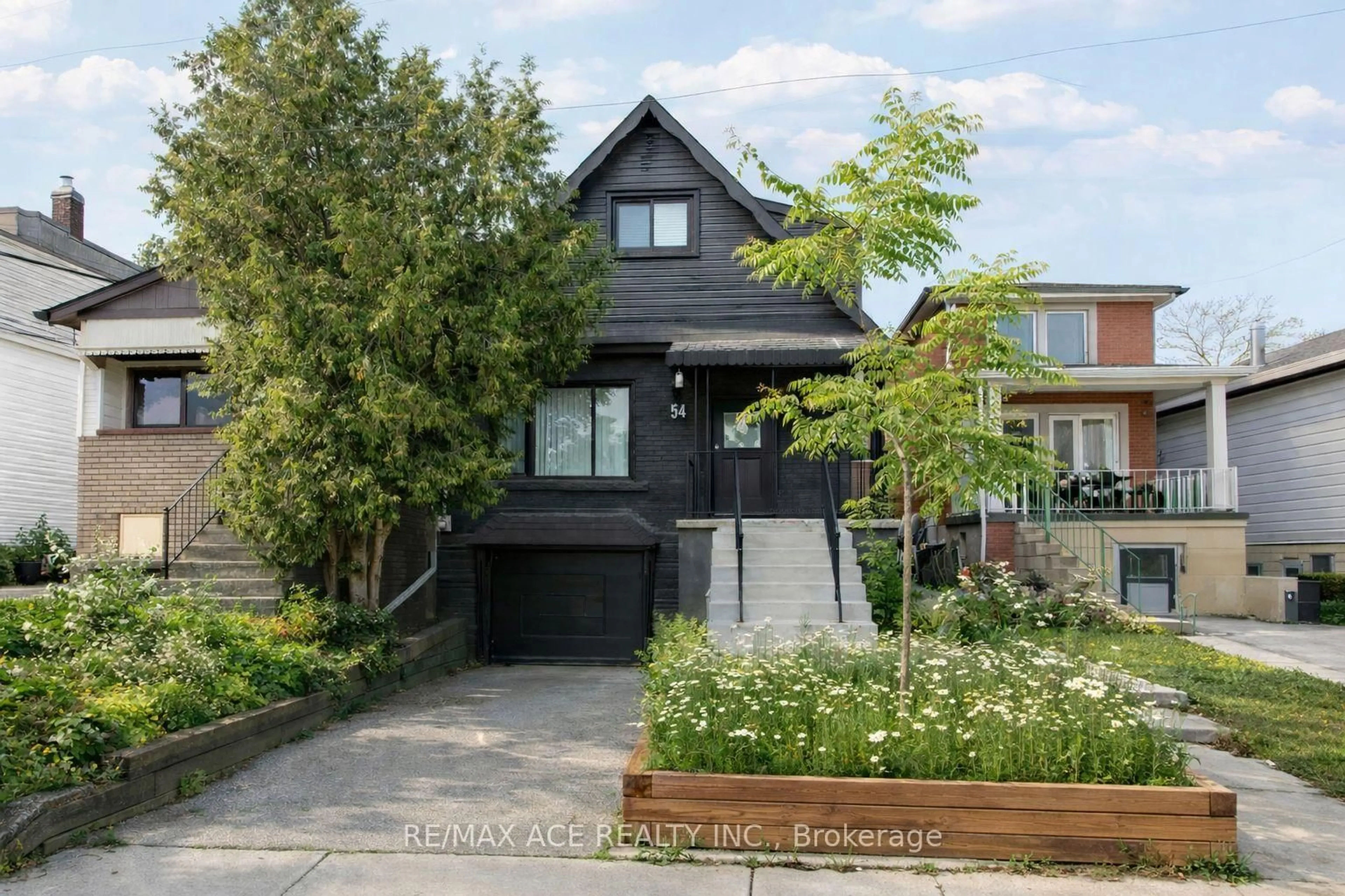 Home with brick exterior material, street for 54 S Woodrow Blvd, Toronto Ontario M1N 3L6