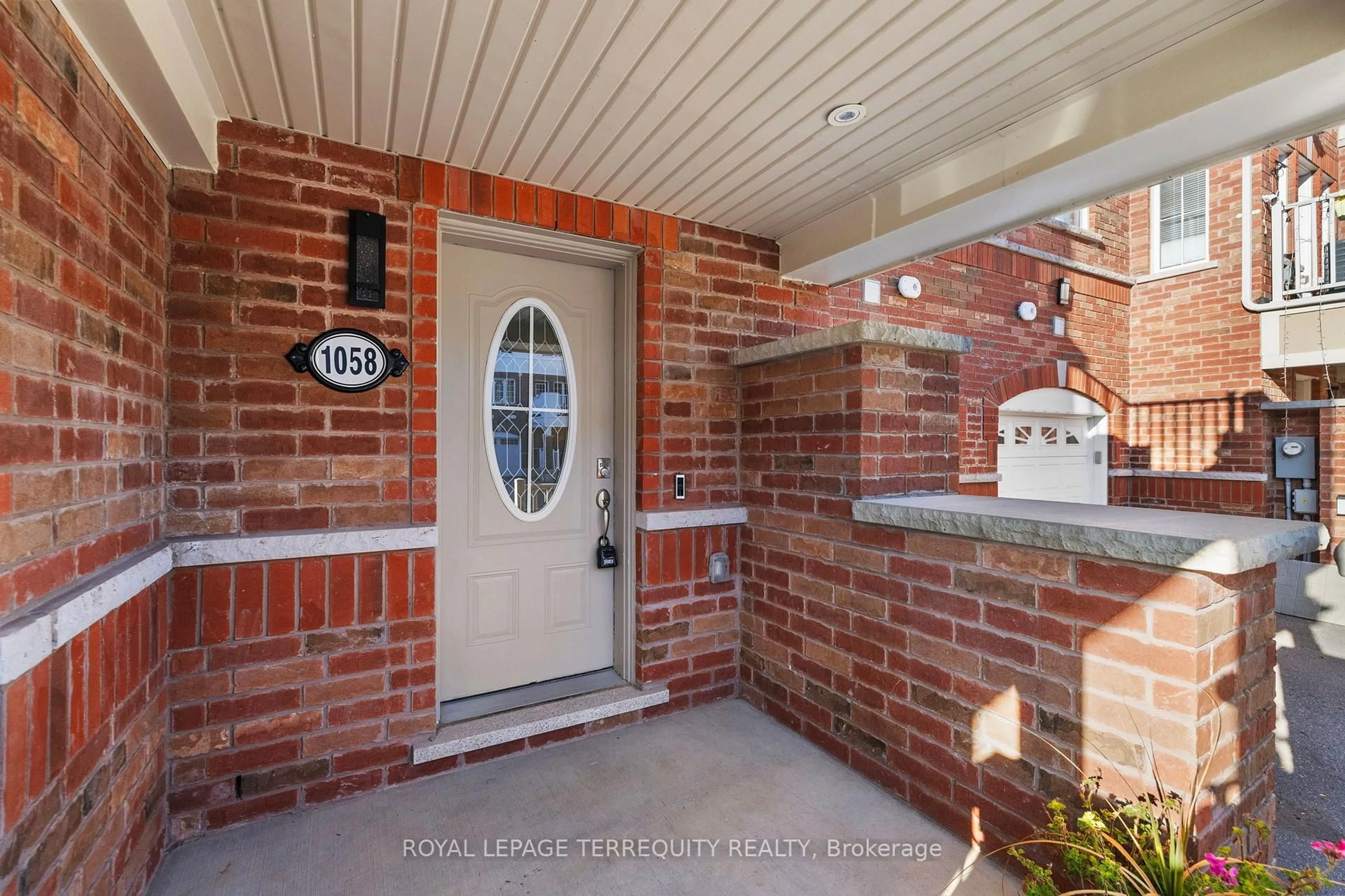 Home with brick exterior material, street for 1058 Clipper Lane, Pickering Ontario L1X 0E9