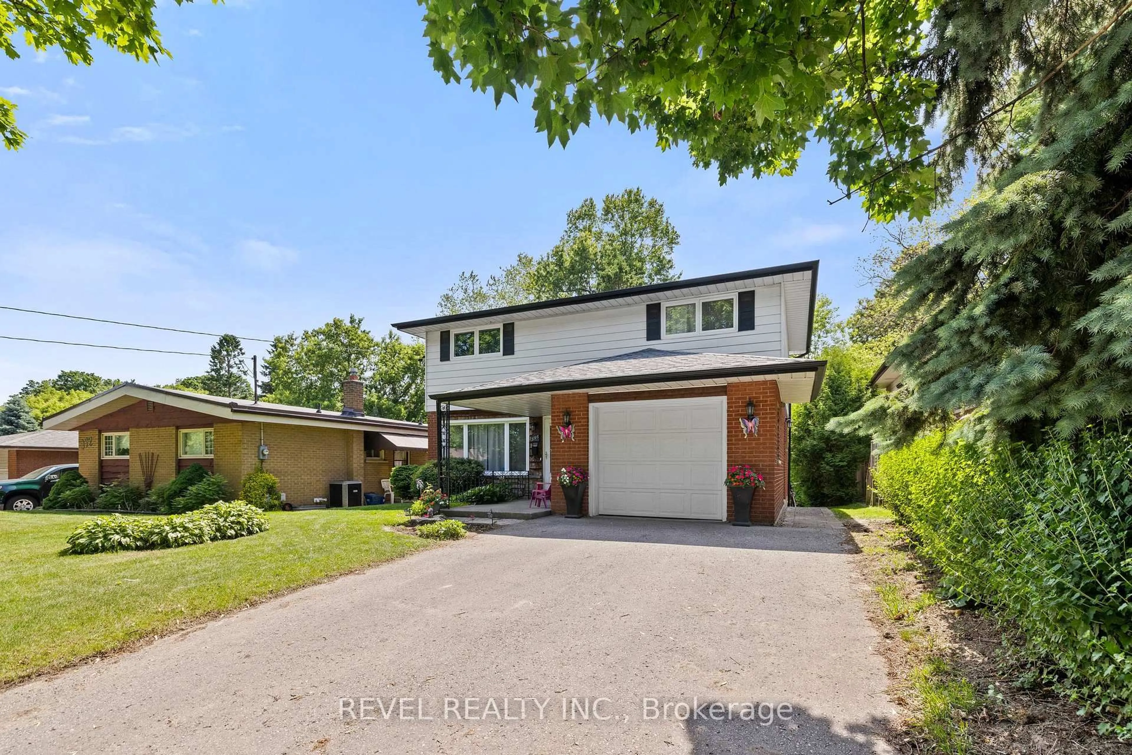 Home with brick exterior material, street for 396 Wilson Rd, Oshawa Ontario L1G 6E5