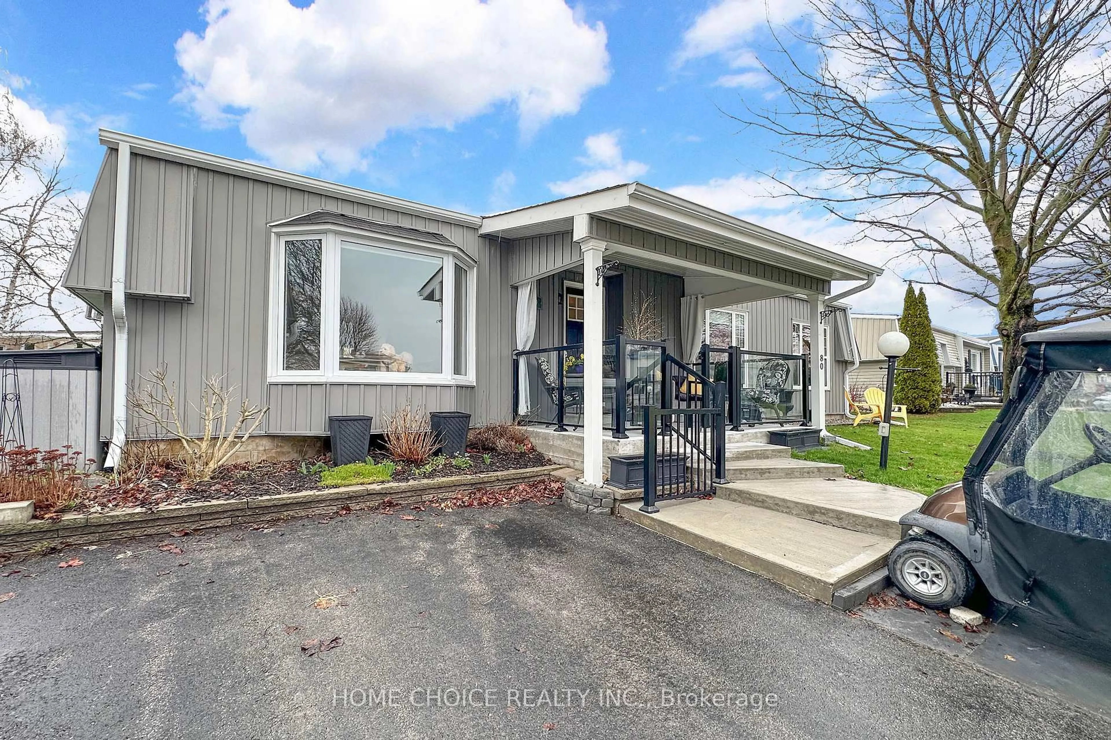 Home with vinyl exterior material, street for 80 Bluffs Rd, Clarington Ontario L1B 1A6