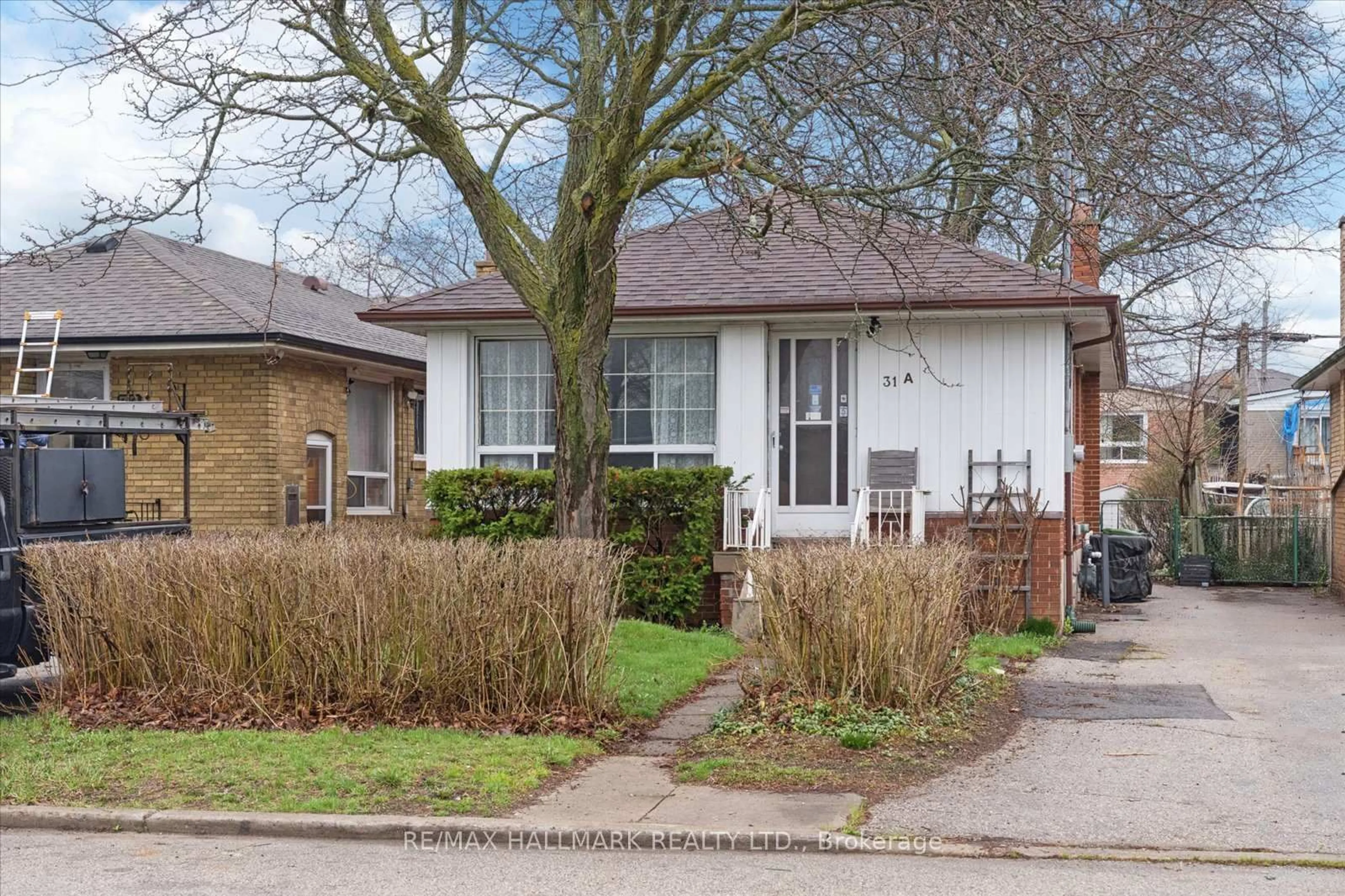 Home with brick exterior material, street for 31A Laurel Ave, Toronto Ontario M1K 3J3