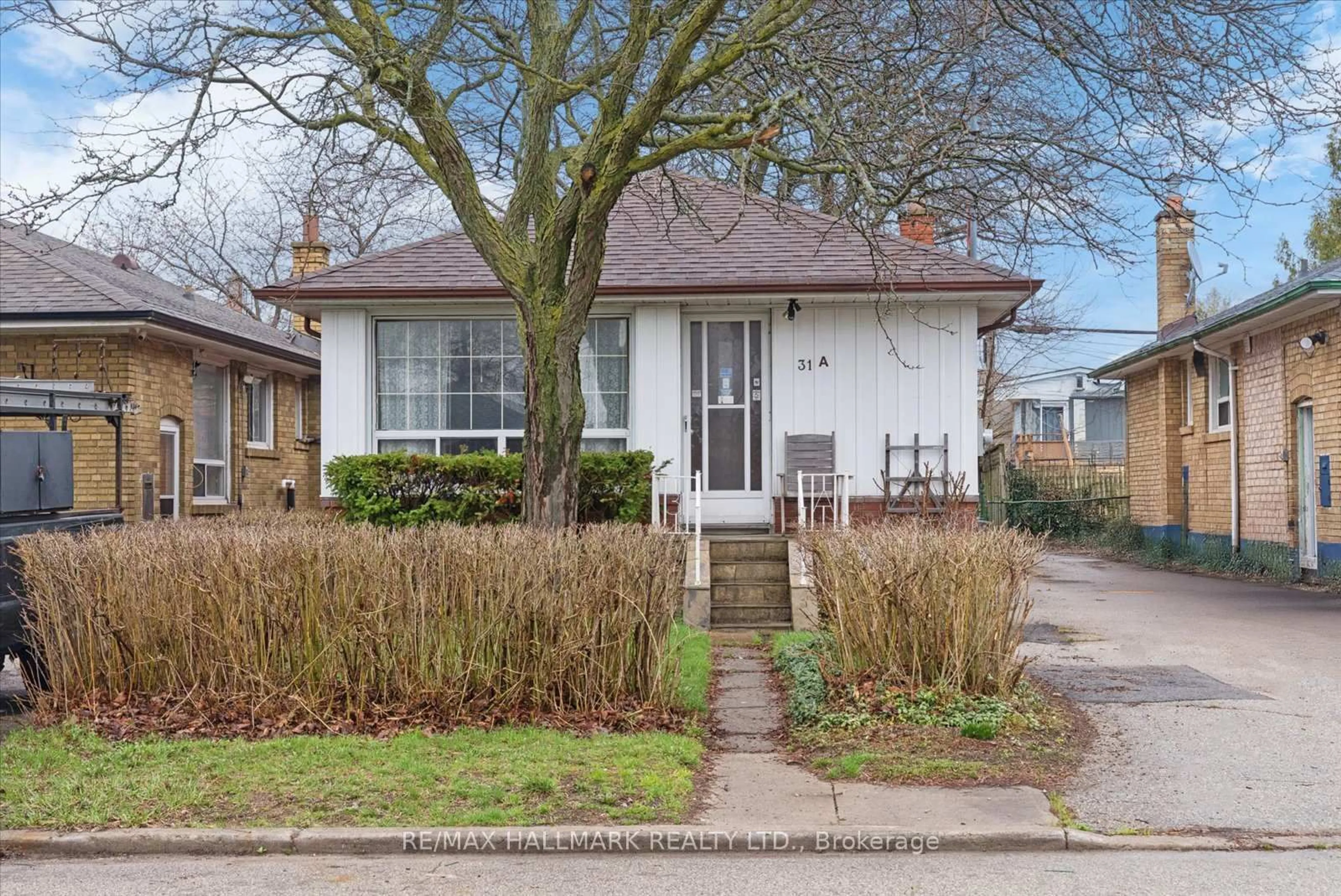 Home with brick exterior material, street for 31A Laurel Ave, Toronto Ontario M1K 3J3