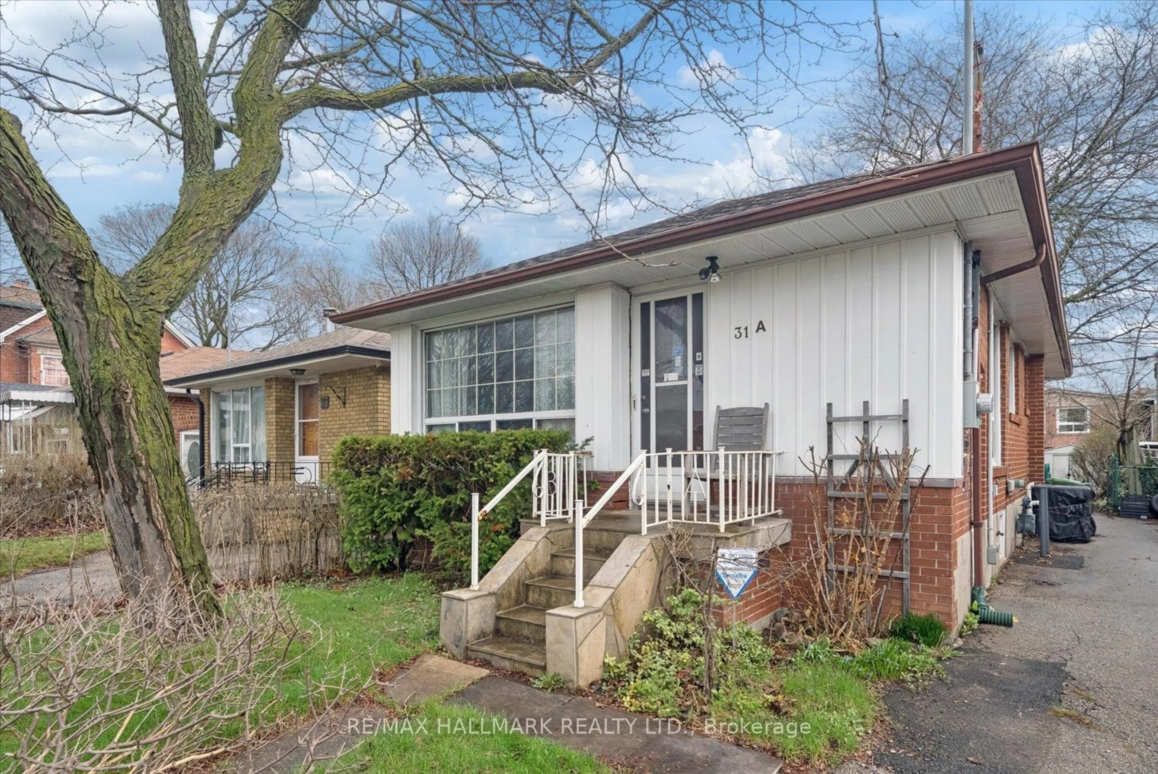 Home with brick exterior material, street for 31A Laurel Ave, Toronto Ontario M1K 3J3
