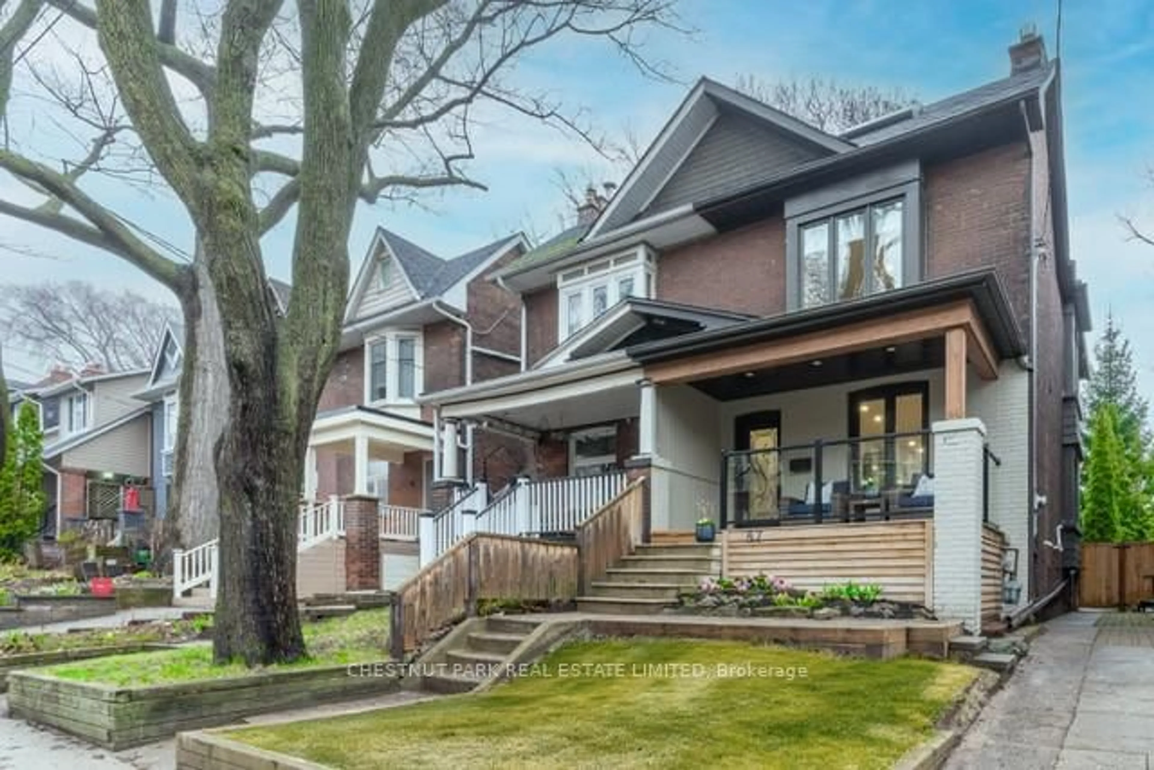 Home with brick exterior material, street for 87 Bowmore Rd, Toronto Ontario M4L 3J1