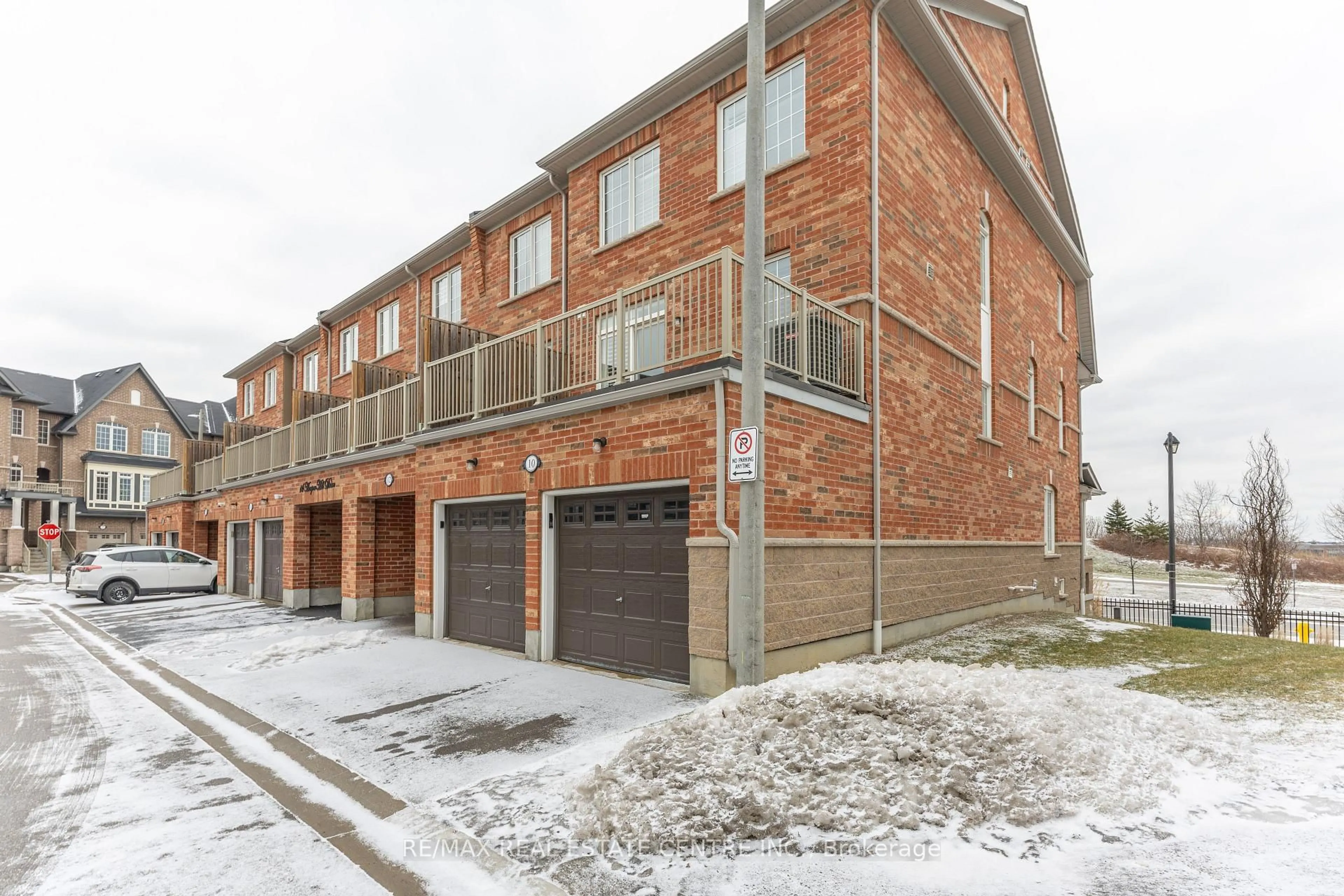 Home with brick exterior material, street for 10 Harper Hill Dr, Ajax Ontario L1Z 0P9