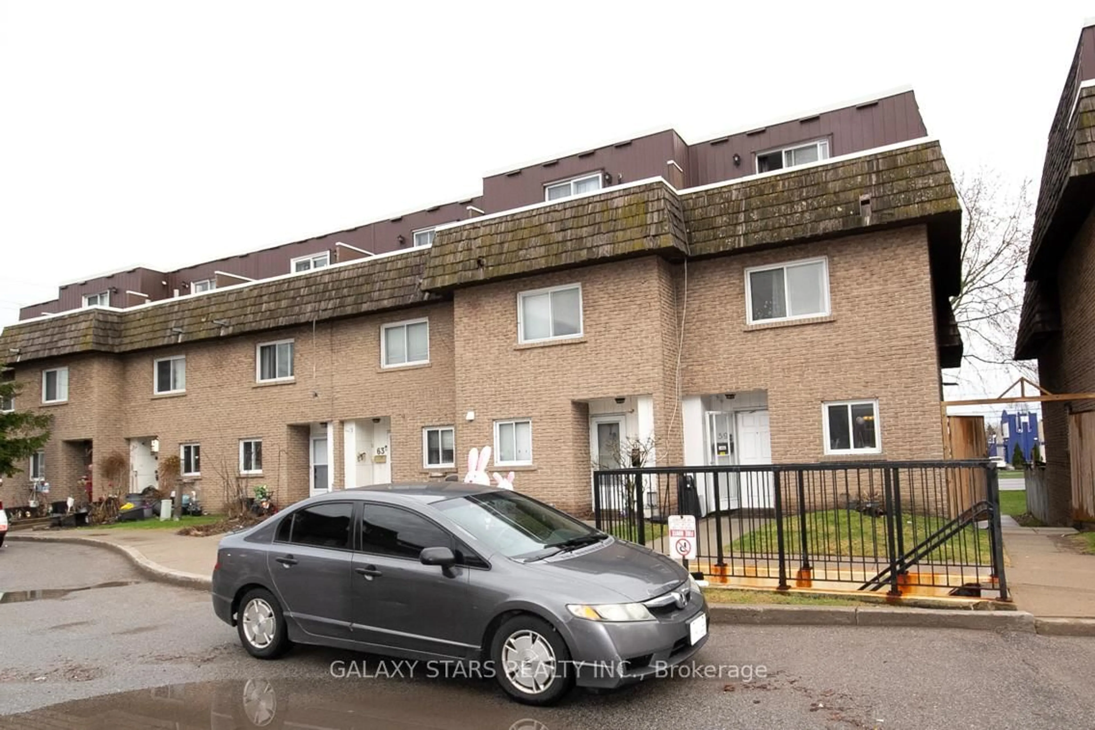 A pic from outside/outdoor area/front of a property/back of a property/a pic from drone, street for 10 Rodda Blvd #59, Toronto Ontario M1E 2Z6