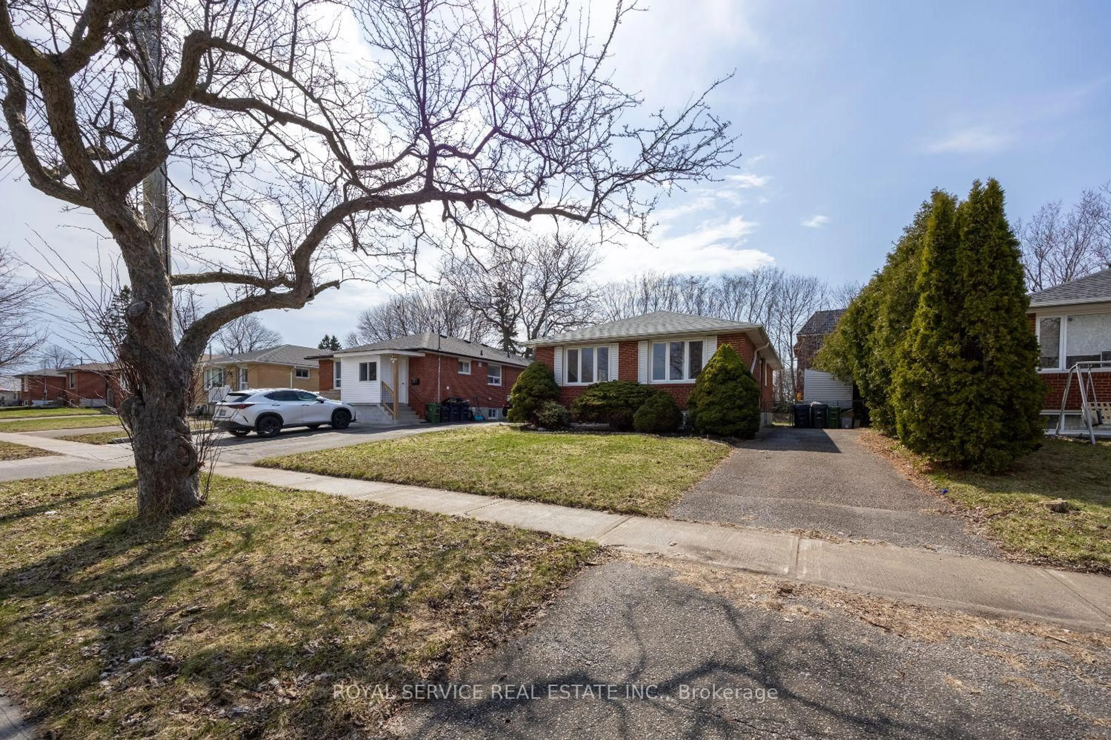 Home with brick exterior material, street for 14 Hathway Dr, Toronto Ontario M1P 4L5