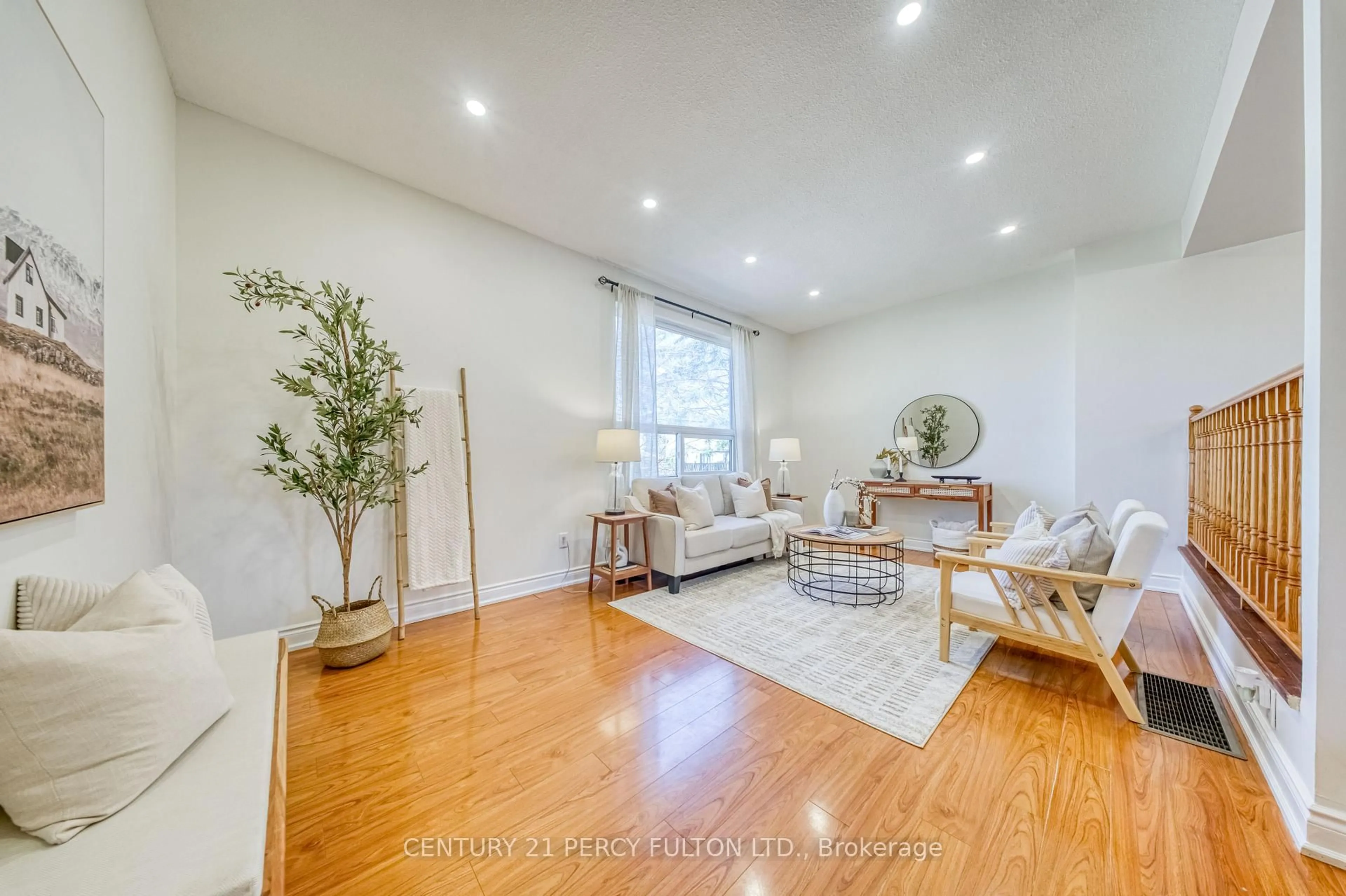 Living room with furniture, wood/laminate floor for 1350 Glenanna Rd #7, Pickering Ontario L1V 2V9