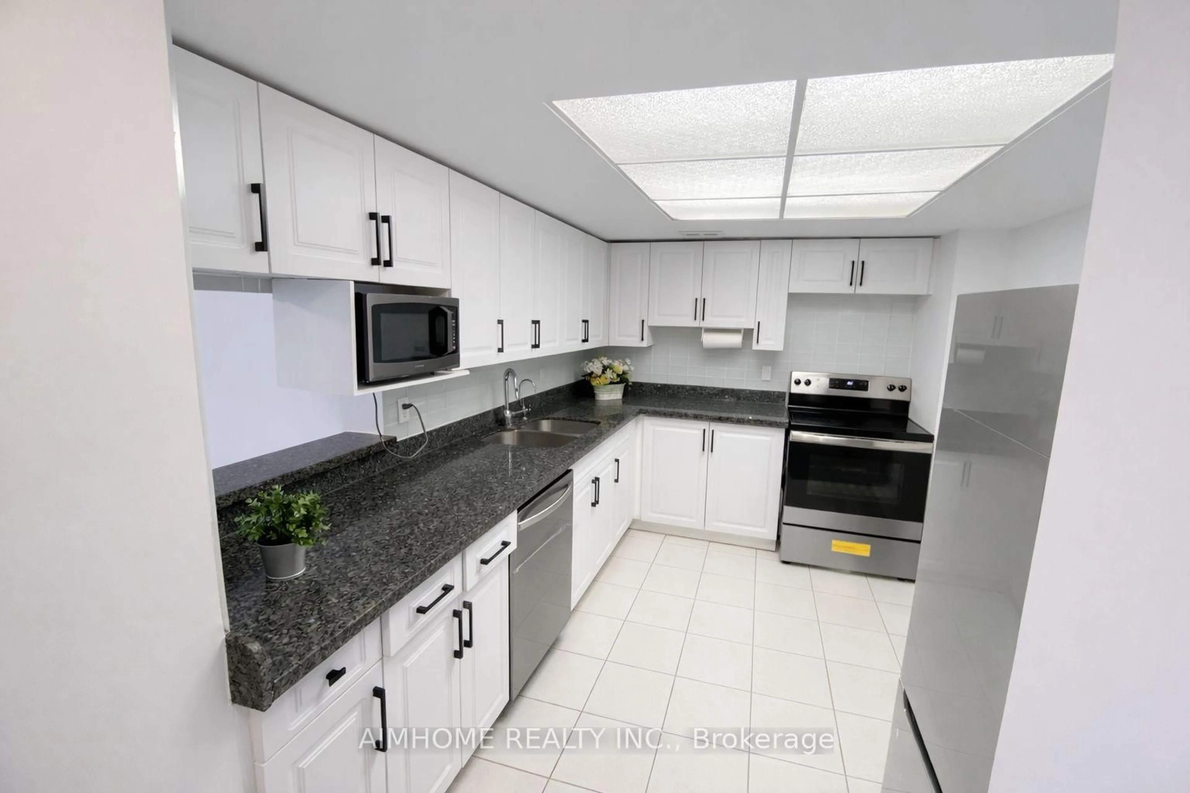 Standard kitchen, ceramic/tile floor for 275 Bamburgh Circ #201, Toronto Ontario M1W 3X4