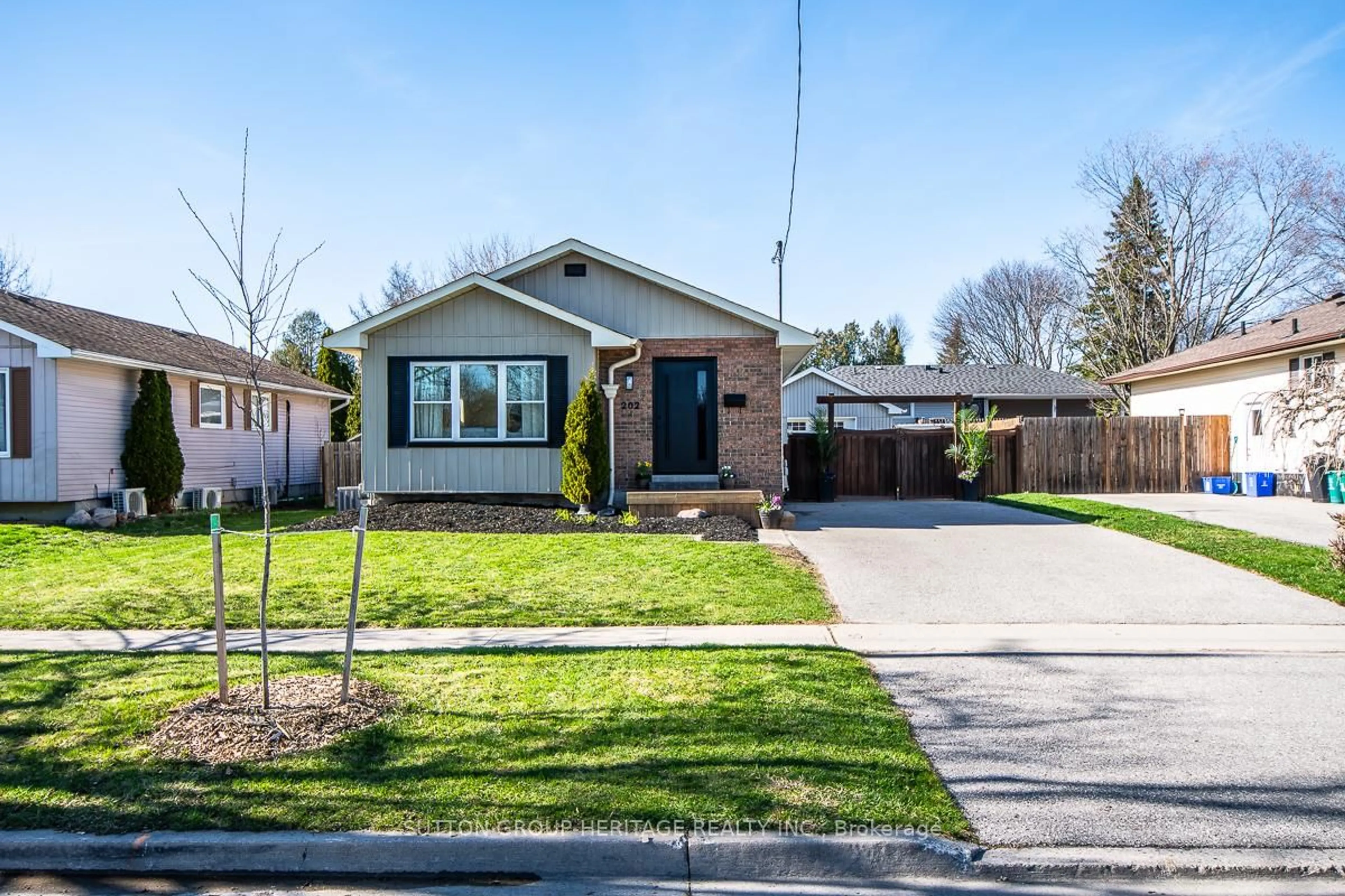 Home with brick exterior material, street for 202 Willis Ave, Whitby Ontario L1N 9J9