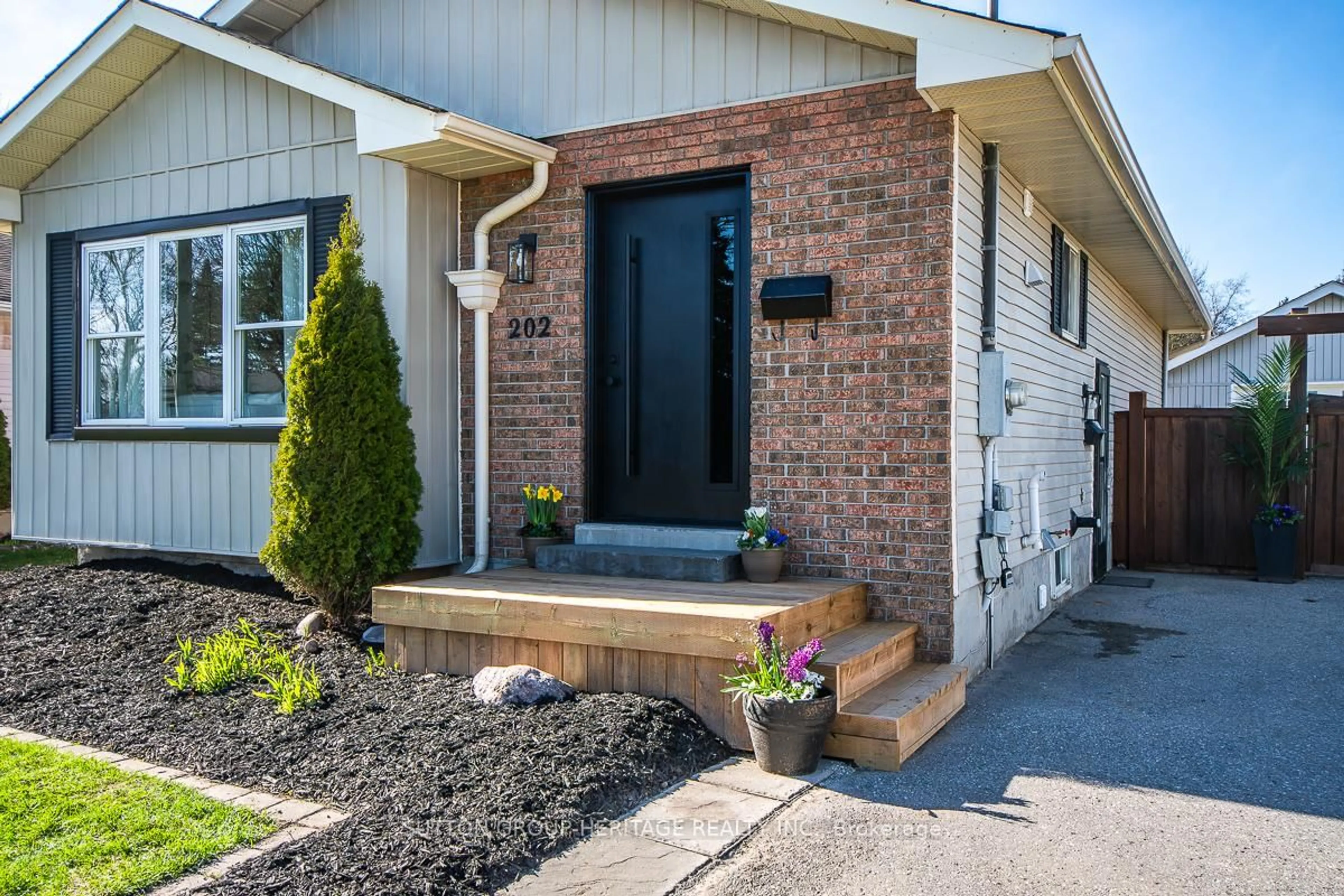 Home with brick exterior material, street for 202 Willis Ave, Whitby Ontario L1N 9J9