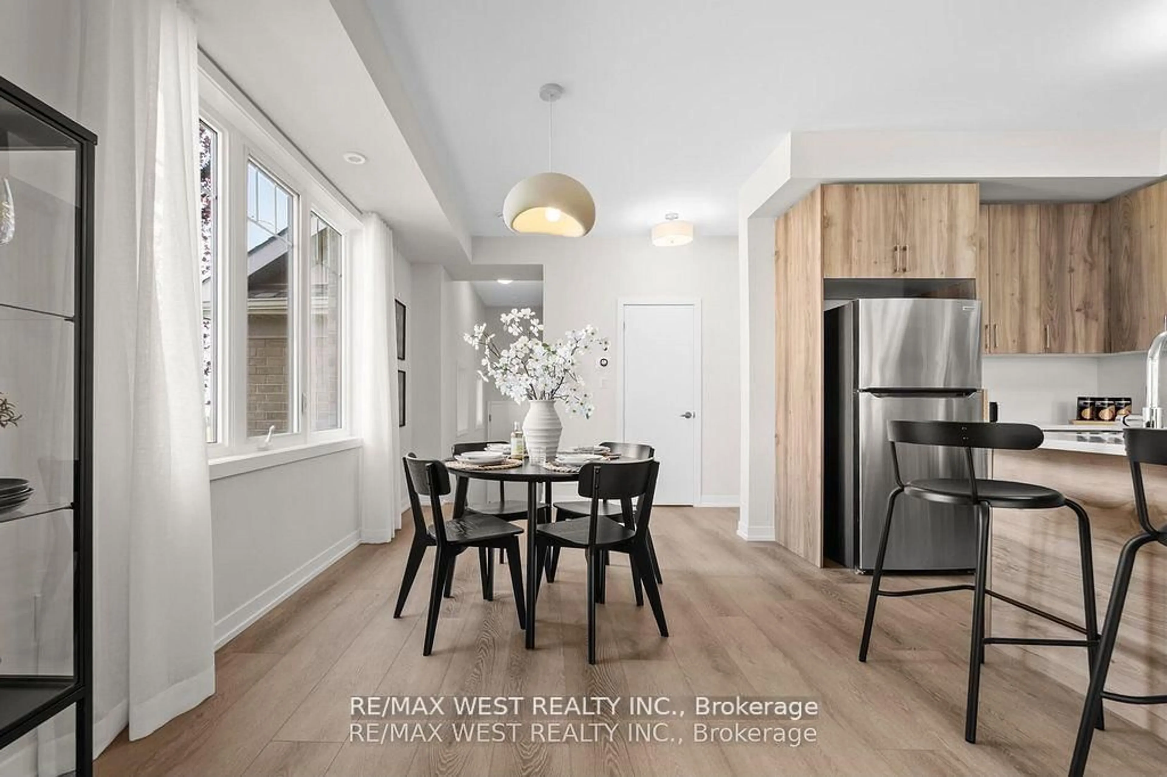 Open concept kitchen, wood/laminate floor for 110 Ziibi Way, Clarington Ontario L1B 1G9