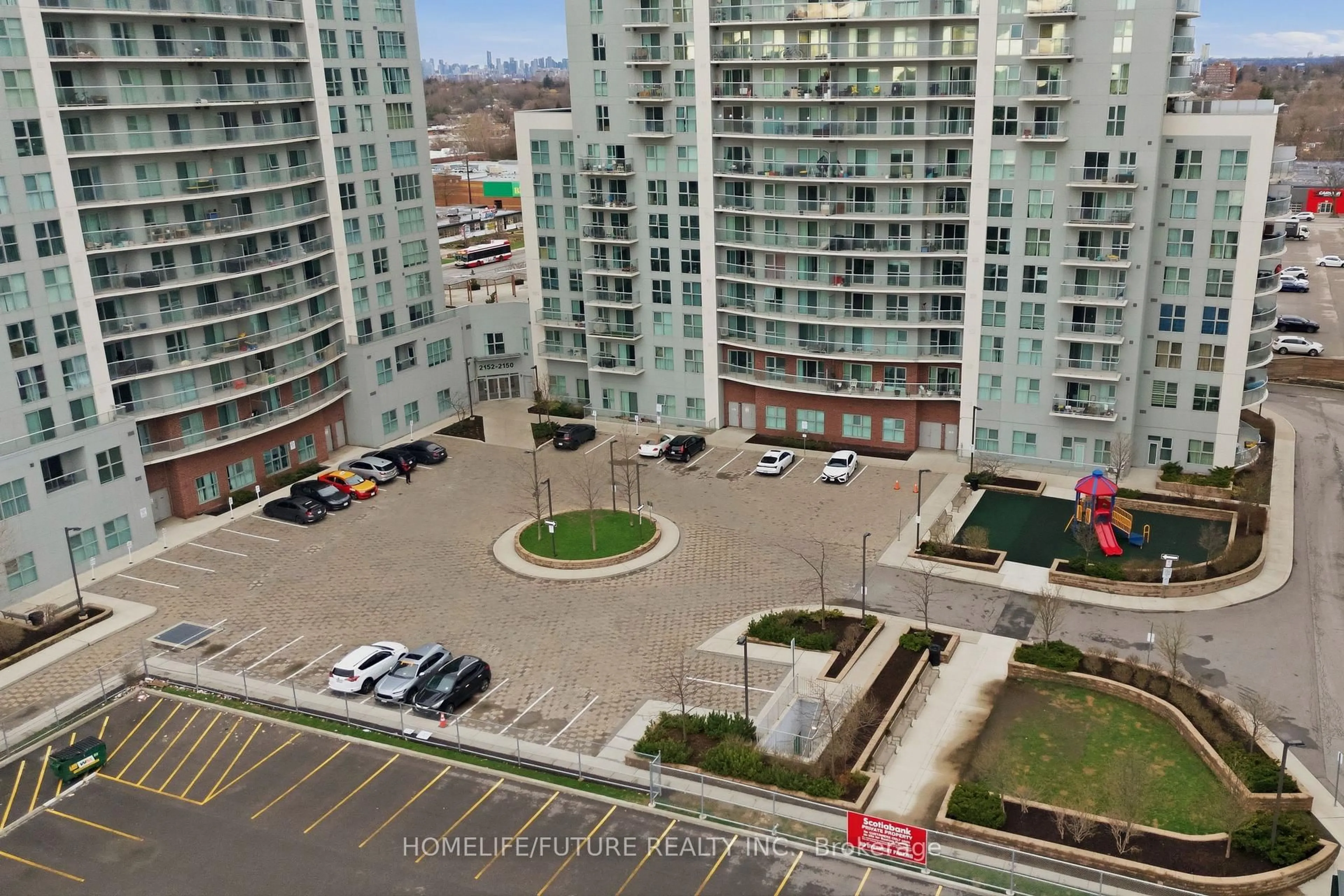 Patio, city buildings view from balcony for 2152 Lawrence Ave #509, Toronto Ontario M1R 0B5