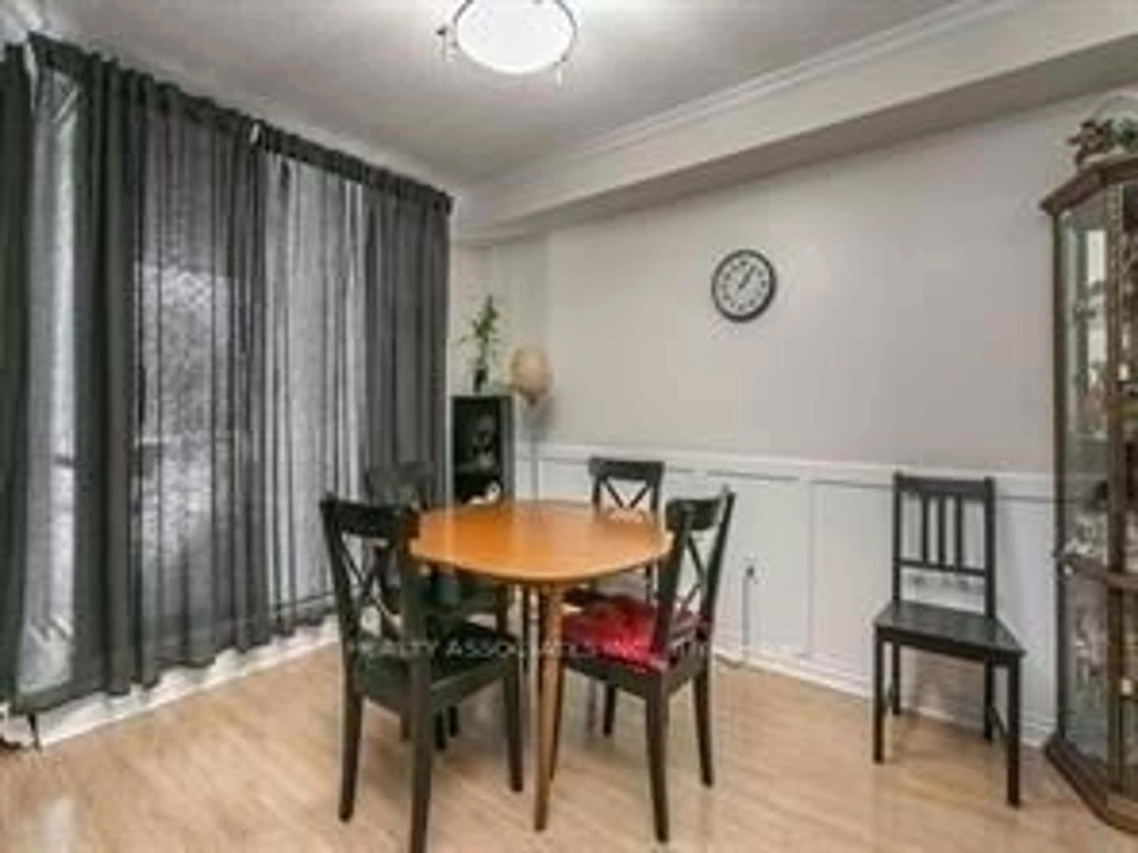 Dining room, wood/laminate floor for 2500 Bridletowne Circ #107, Toronto Ontario M1W 2V6