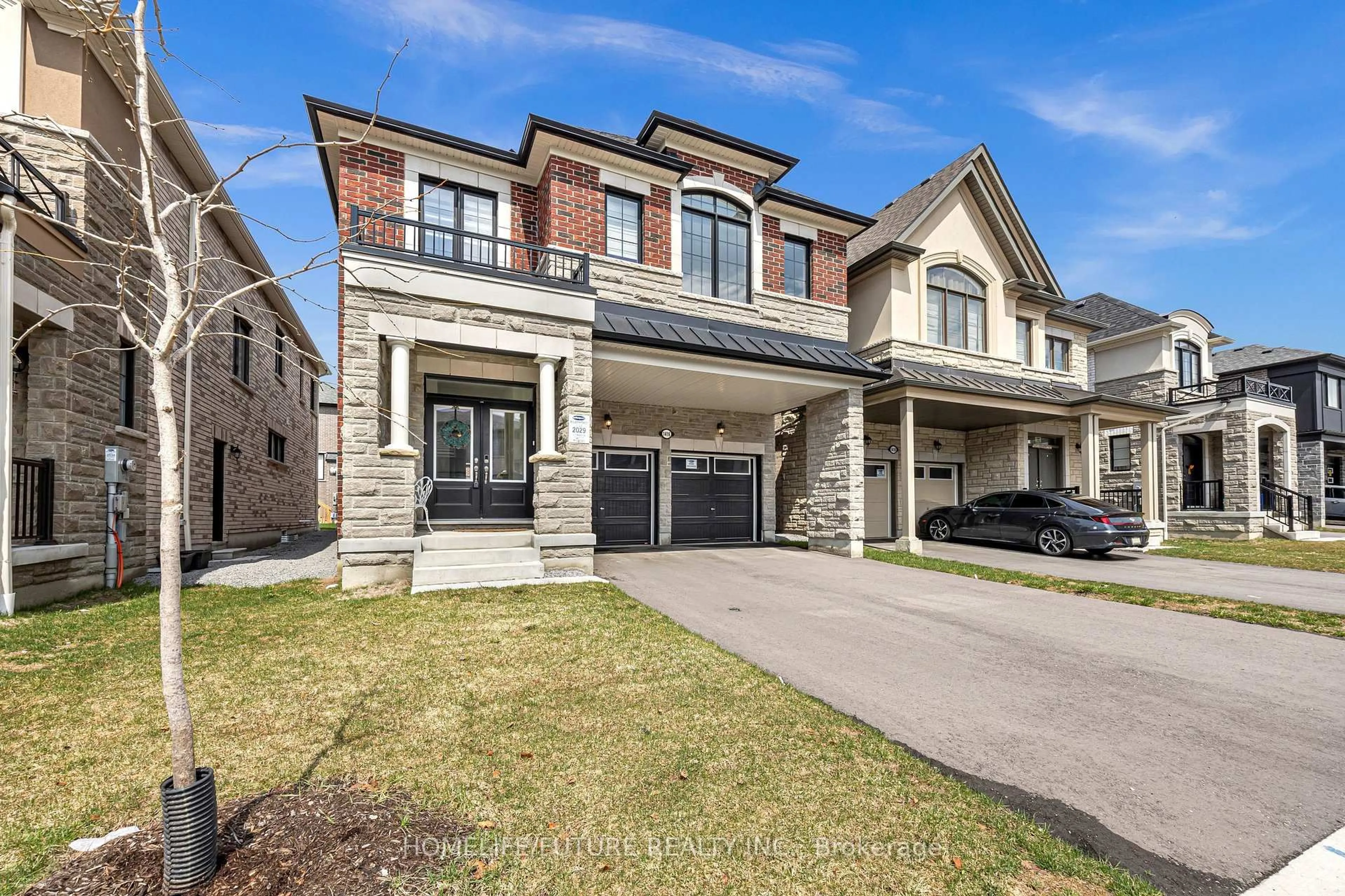 Home with brick exterior material, street for 1416 Swallowtail Lane, Pickering Ontario L1X 0N8