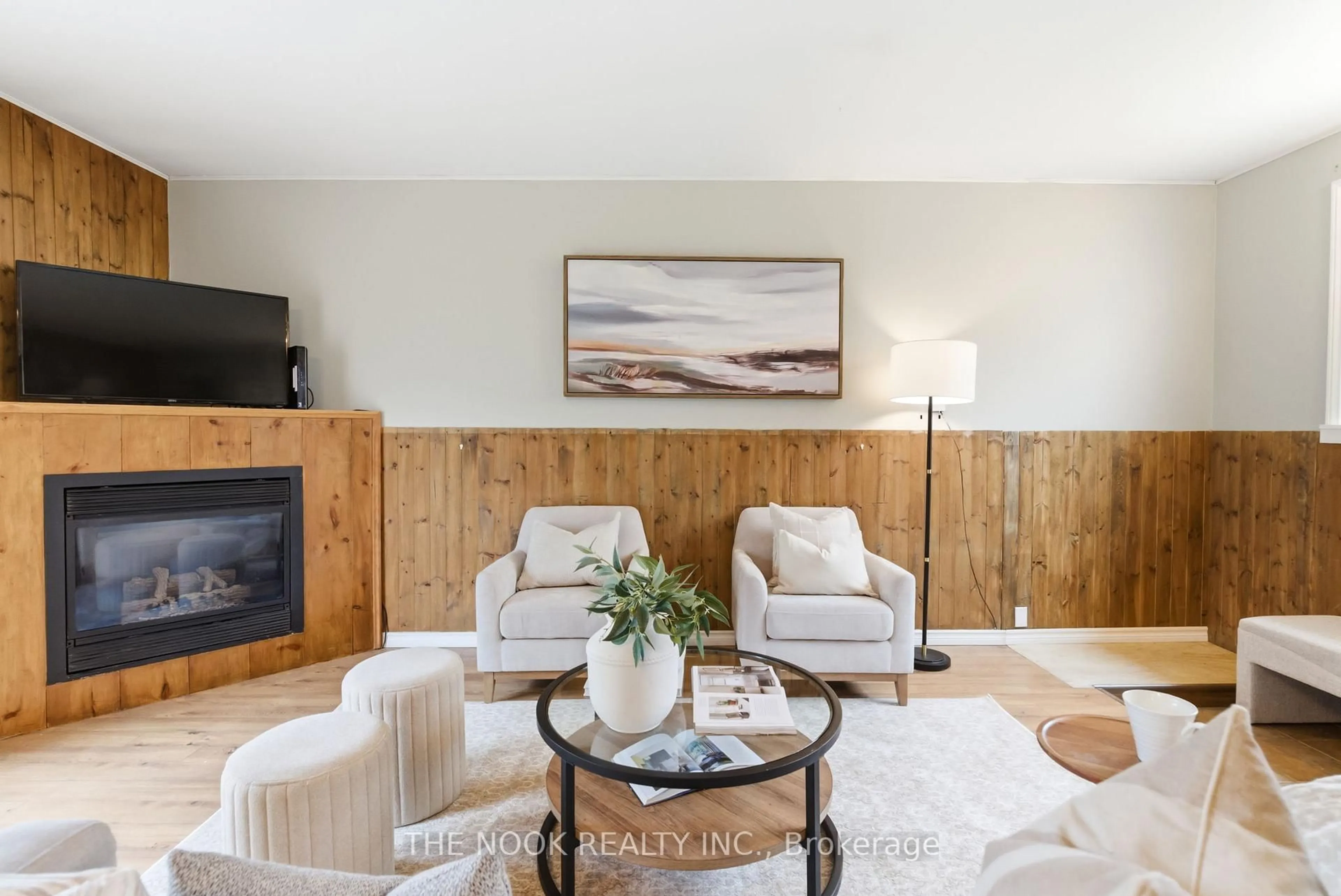 Living room with furniture, wood/laminate floor for 3824 Trulls Rd, Clarington Ontario L1E 2L3