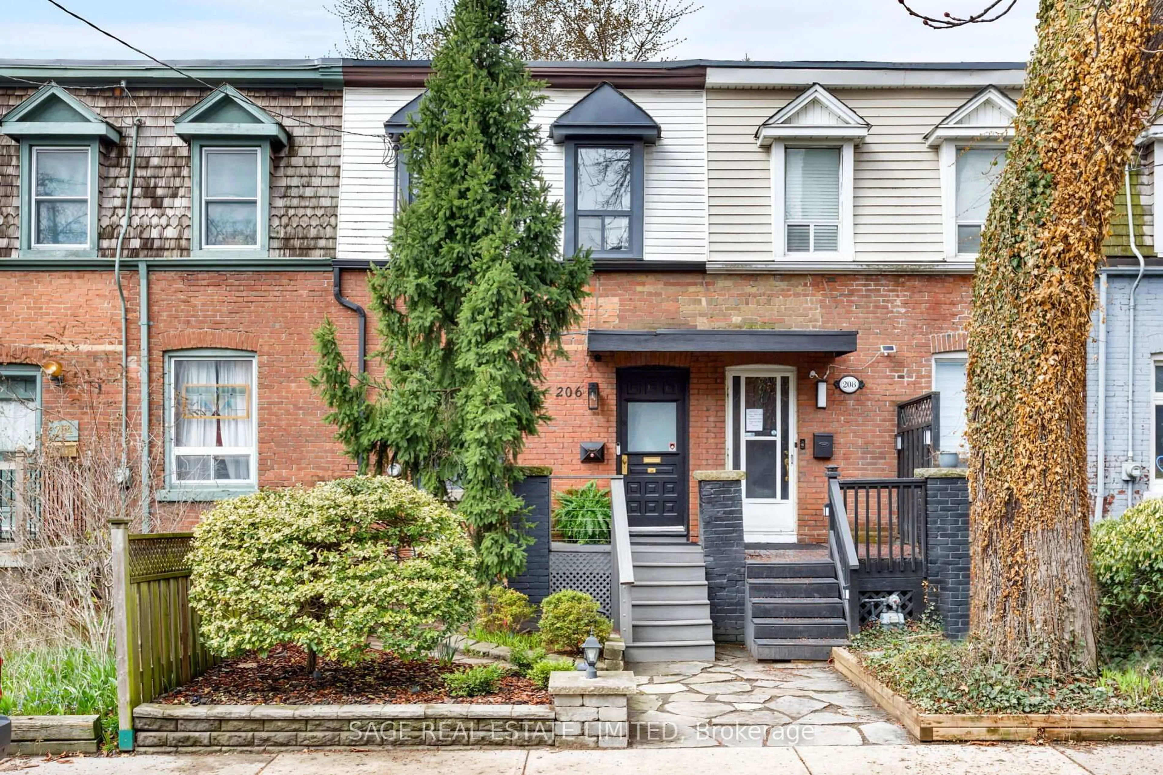 Home with brick exterior material, street for 206 Hamilton St, Toronto Ontario M4M 2E2
