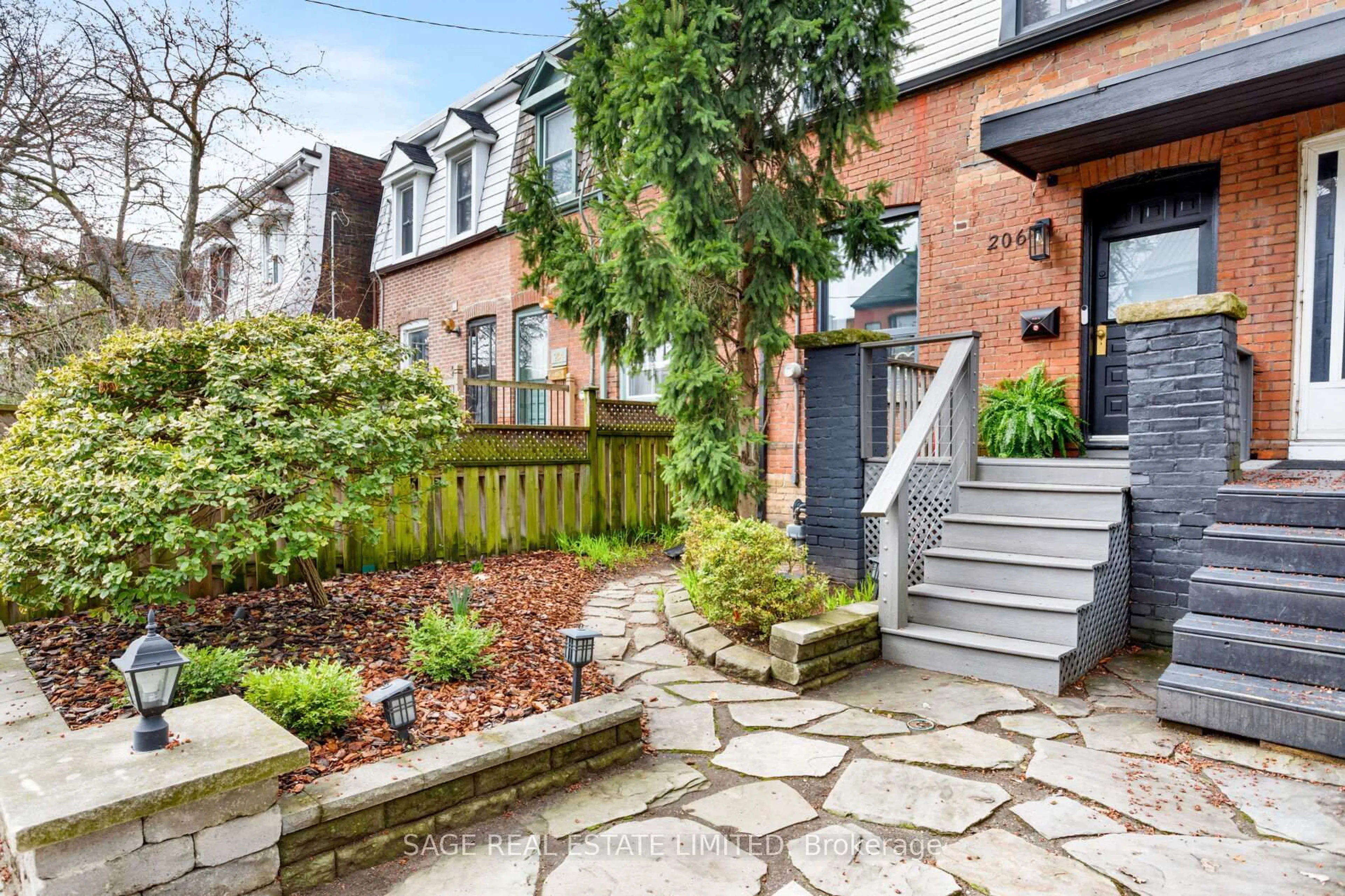 Home with brick exterior material, street for 206 Hamilton St, Toronto Ontario M4M 2E2