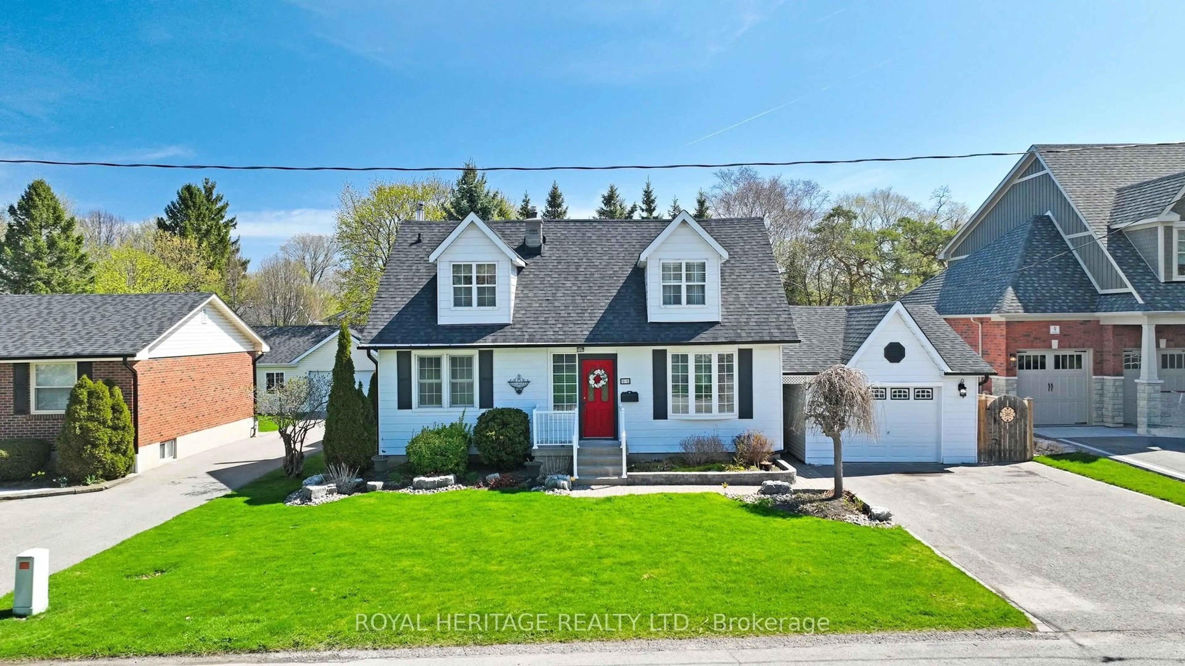 Home with vinyl exterior material, street for 11 Durham St, Whitby Ontario L1M 1A5