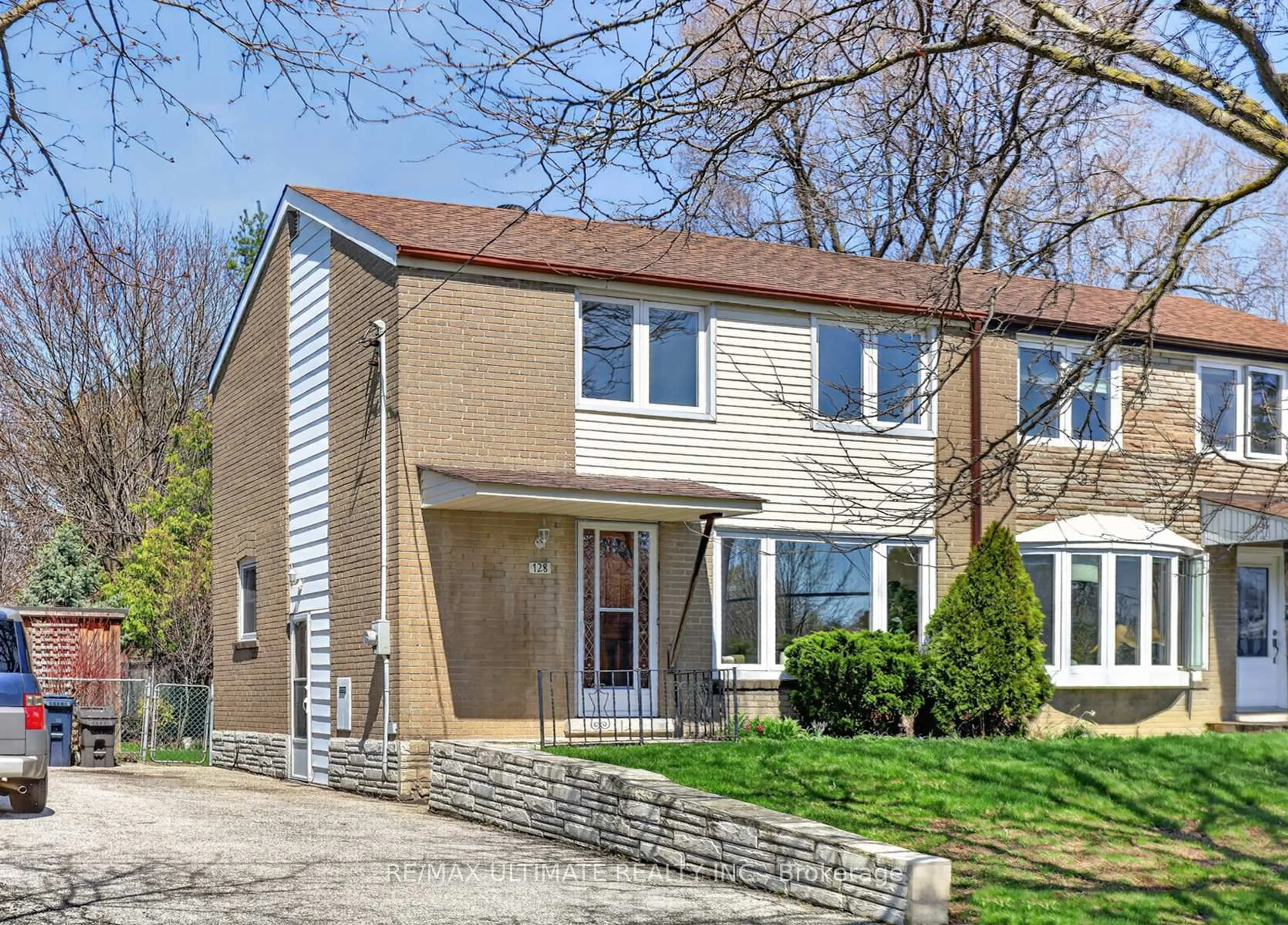 Home with brick exterior material, street for 128 Woodfern Dr, Toronto Ontario M1K 2L5