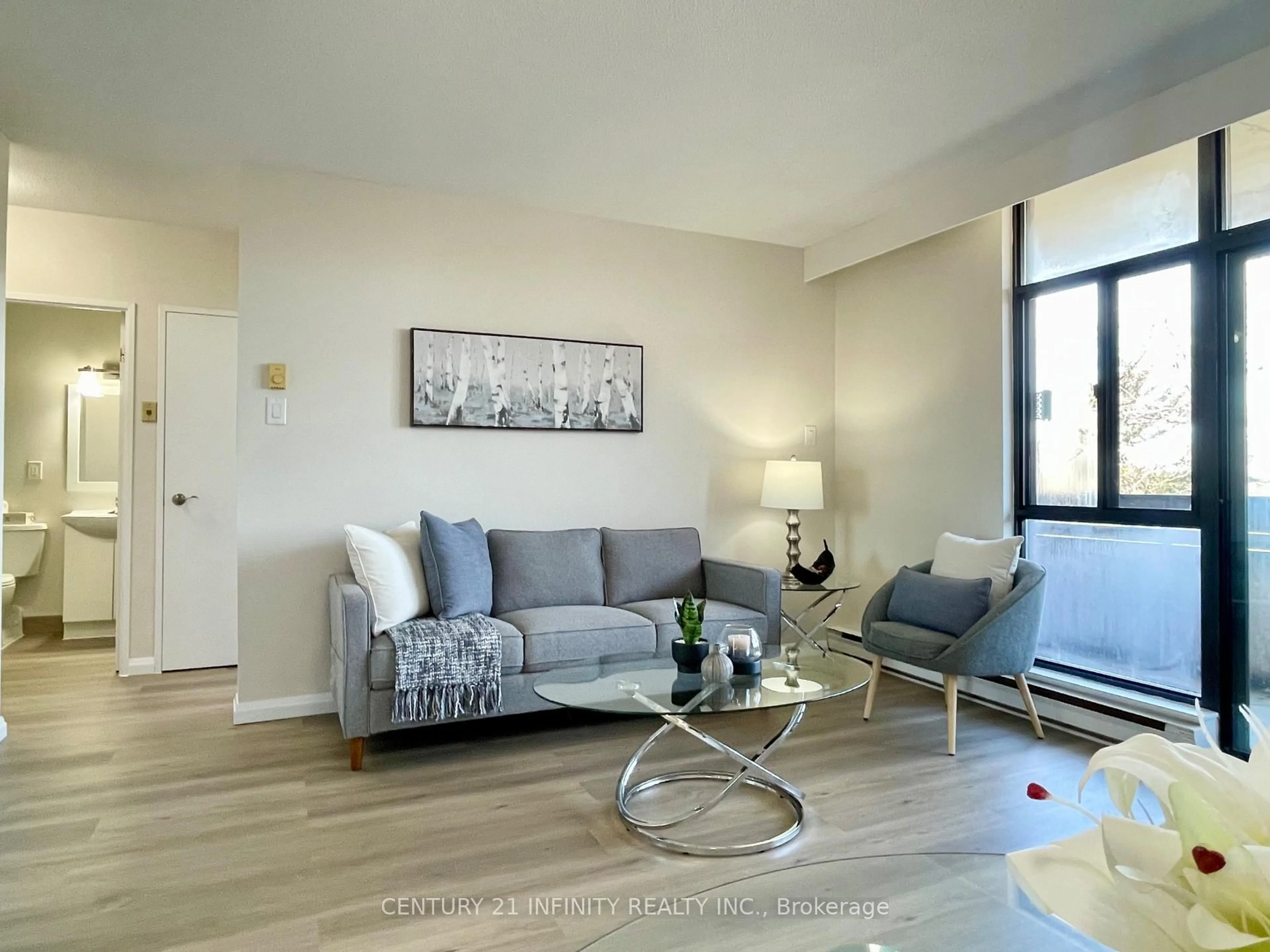 Living room with furniture, unknown for 50 Old Kingston Rd #5-606, Toronto Ontario M1E 4Y1