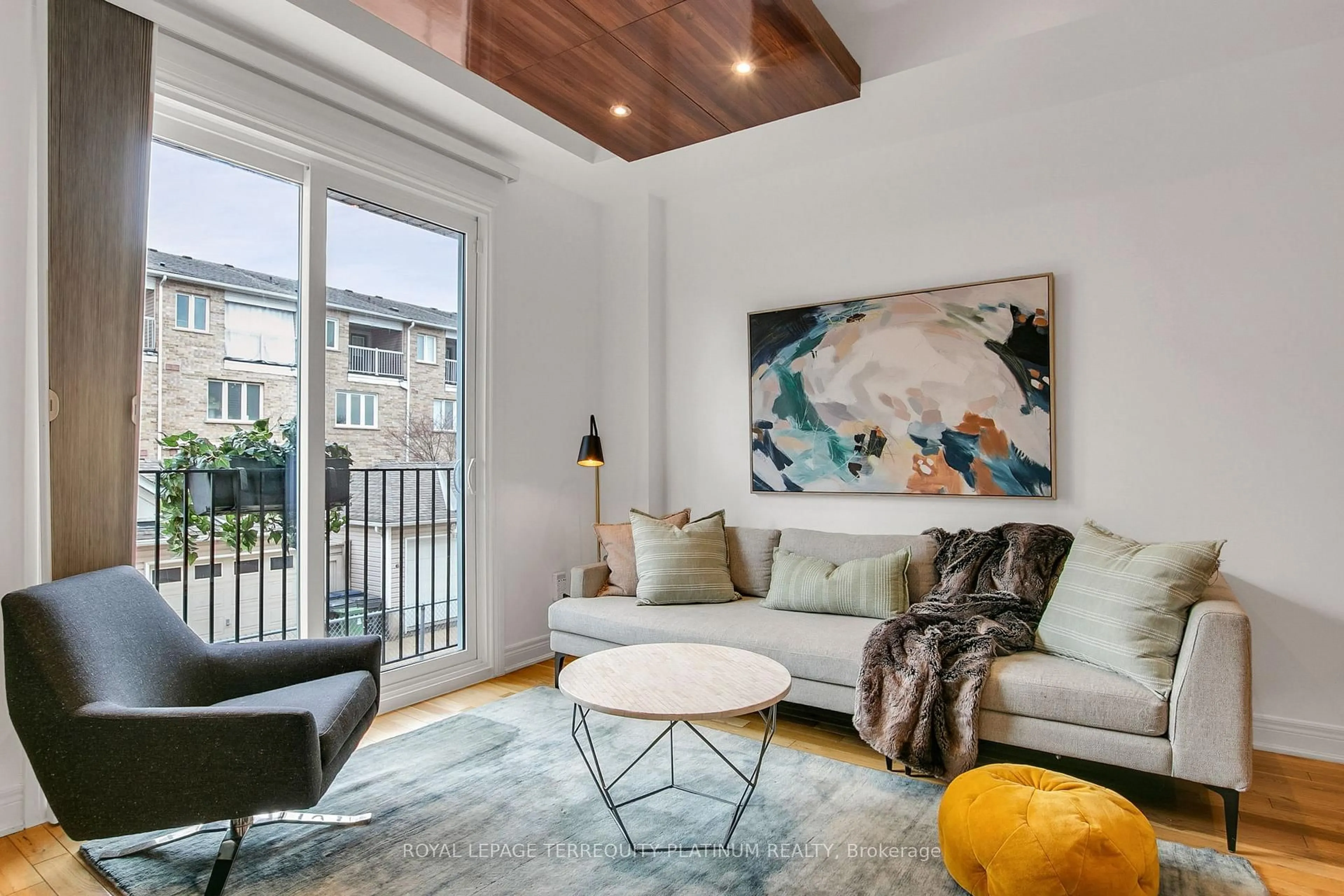 Living room with furniture, unknown for 22 Fairhead Mews, Toronto Ontario M4E 3Y4