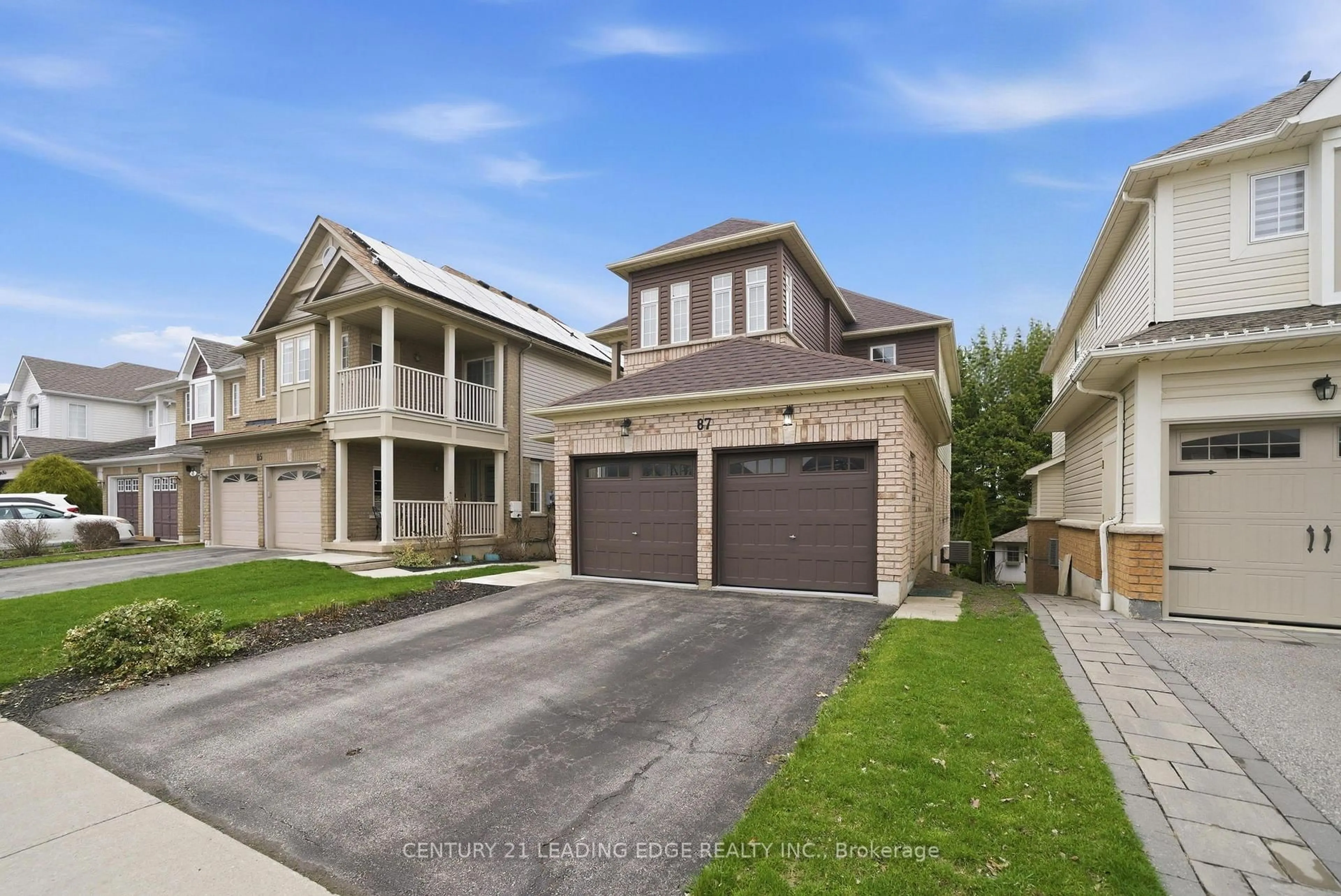 Home with brick exterior material, street for 87 Tallships Dr, Whitby Ontario L1N 9X5