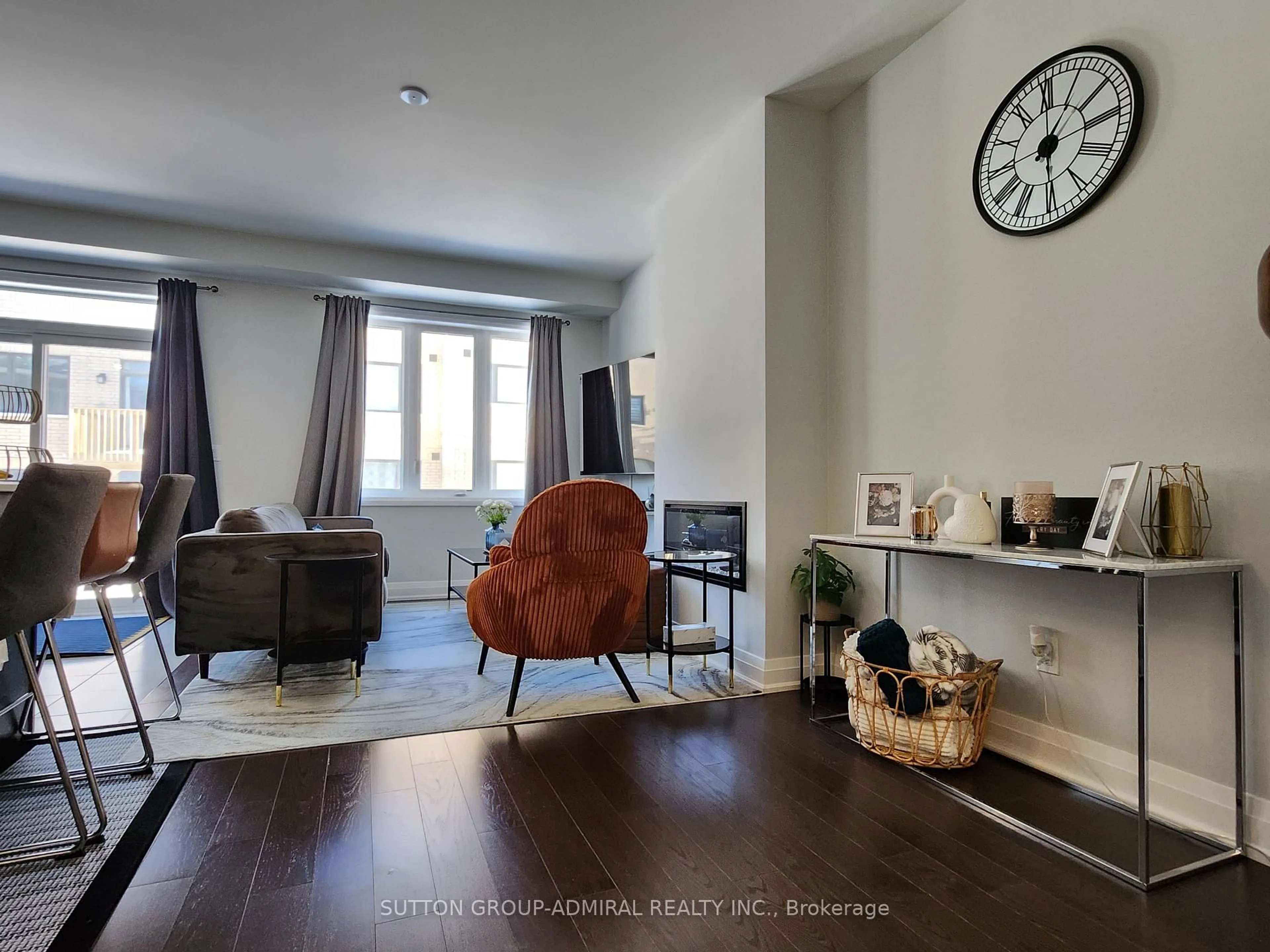 Living room with furniture, wood/laminate floor for 984 Crowsnest Hllw, Pickering Ontario L1X 0P4