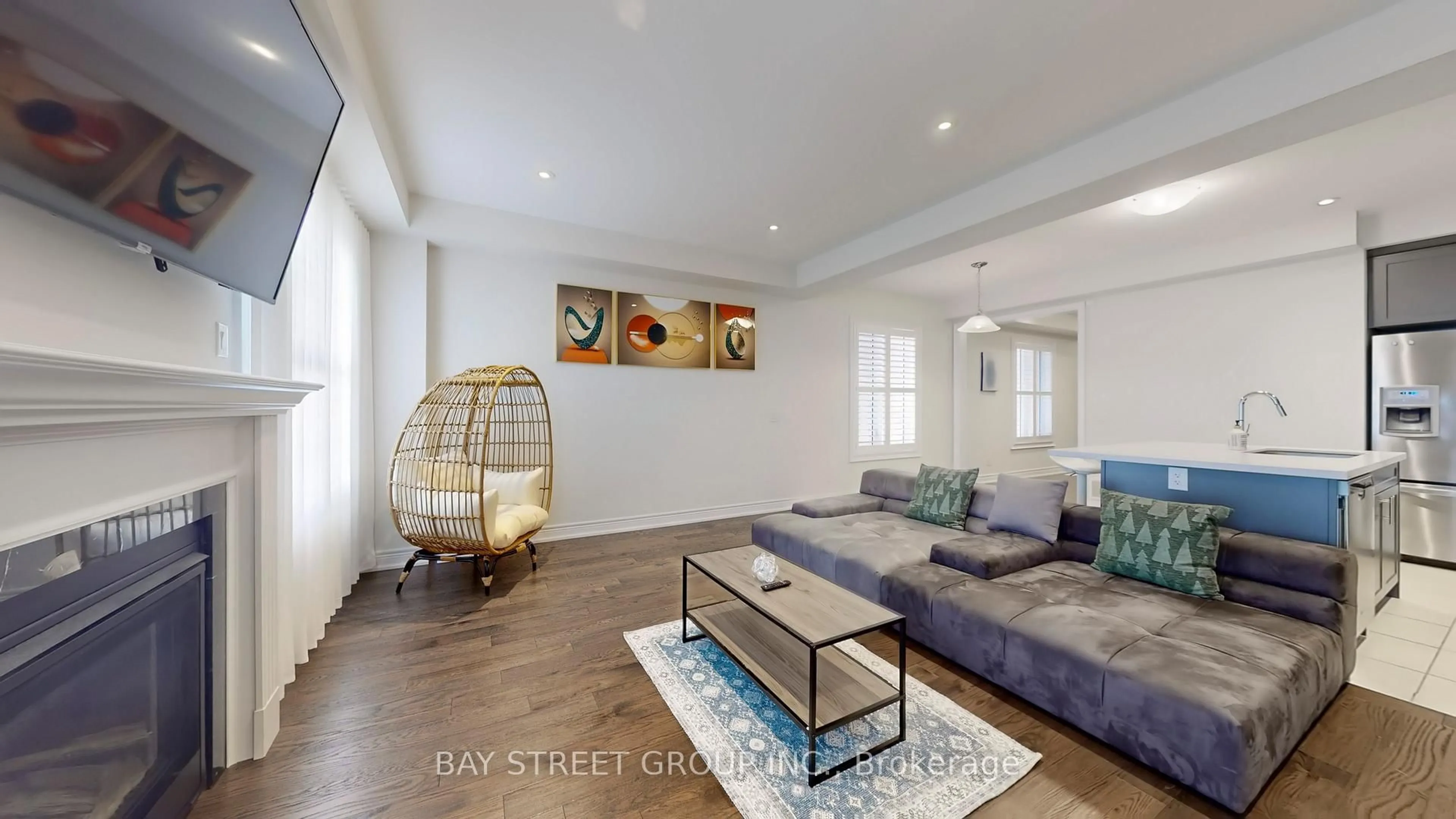 Living room with furniture, wood/laminate floor for 110 Christine Elliott Ave, Whitby Ontario L1P 0E1