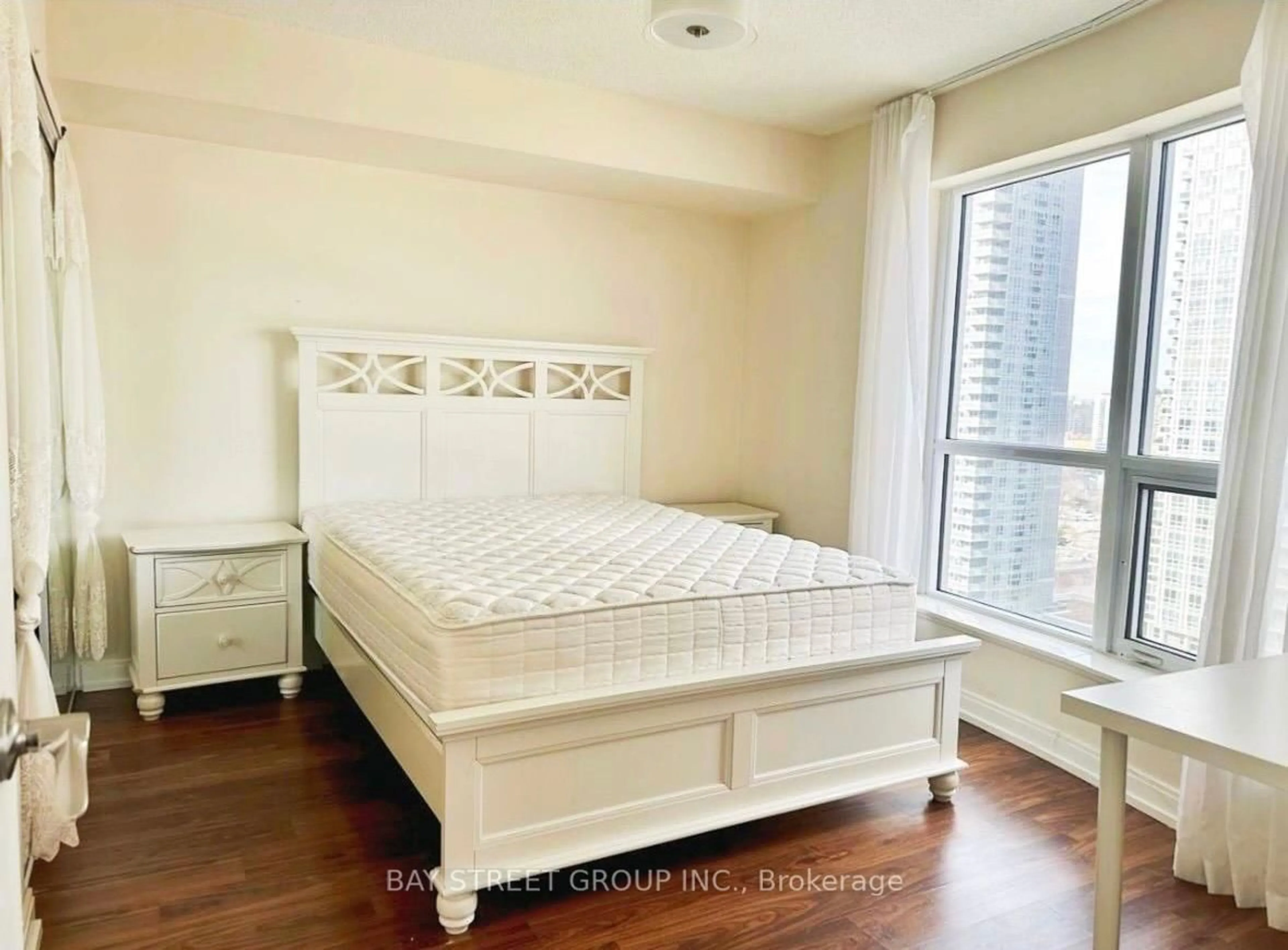 Bedroom with bed, wood/laminate floor for 151 Village Green Sq #1908, Toronto Ontario M1S 0K5