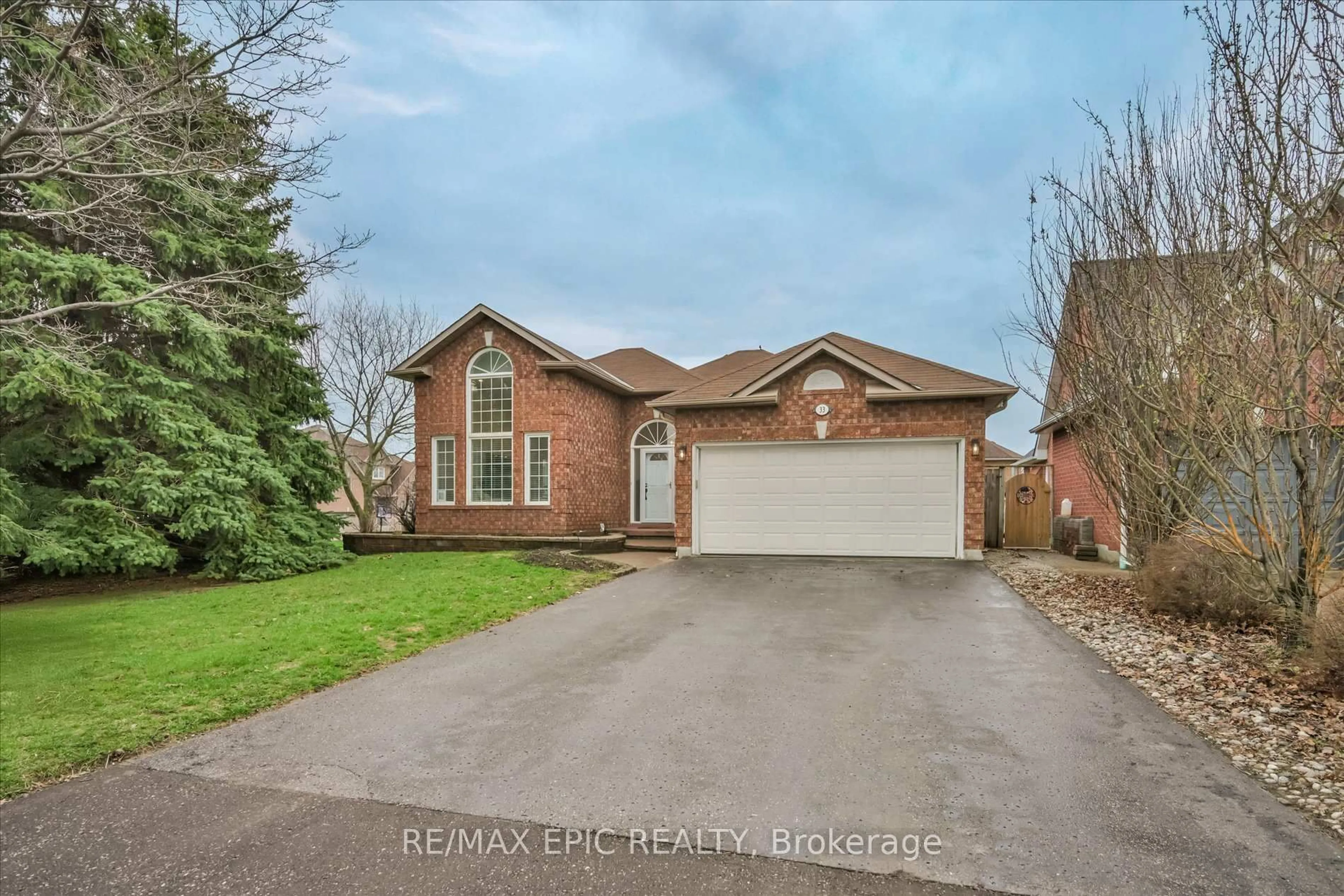 Home with brick exterior material, street for 33 EMMETT Pl, Whitby Ontario L1R 2B4