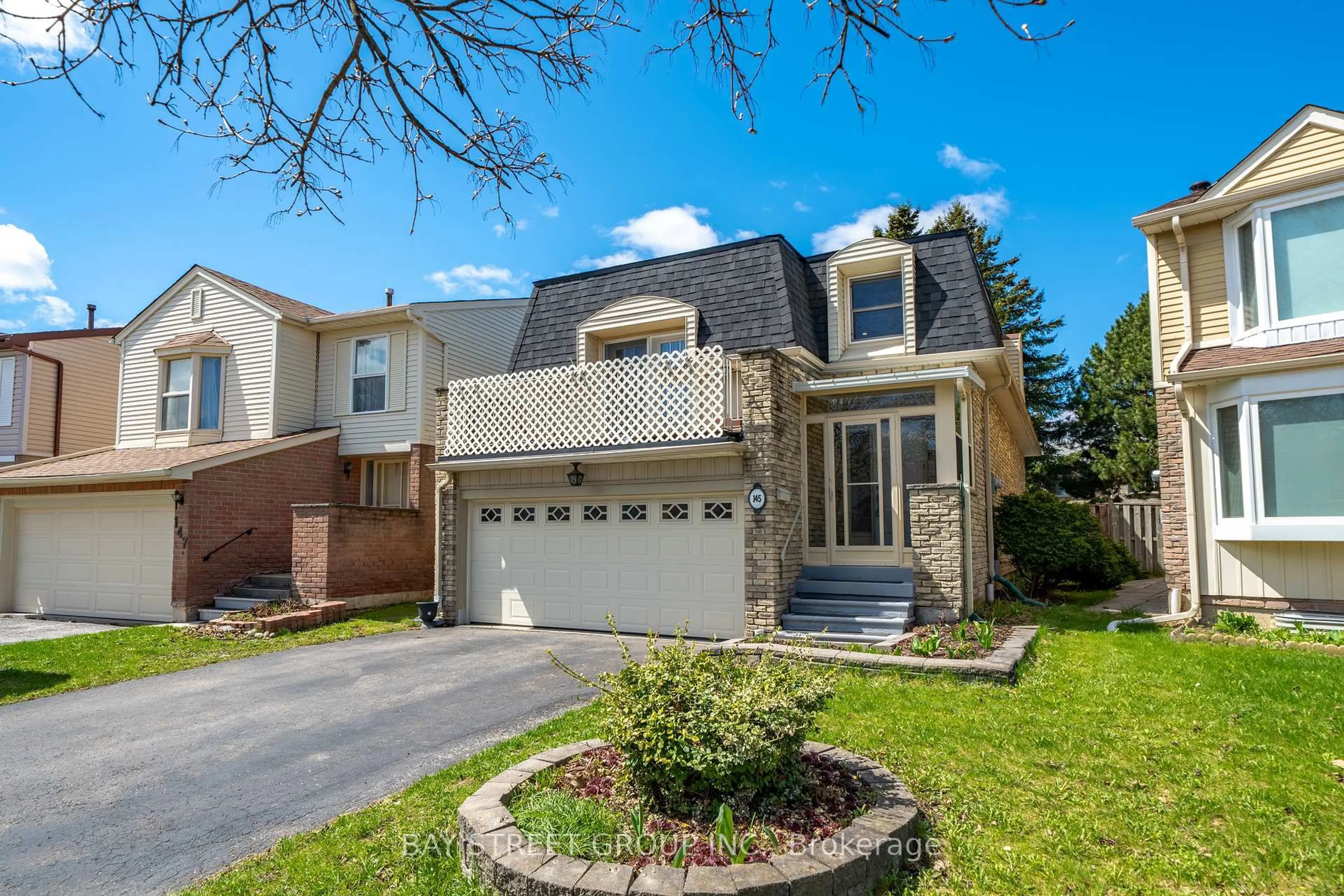 Home with brick exterior material, street for 145 Sandyhook Sq, Toronto Ontario M1W 3N6