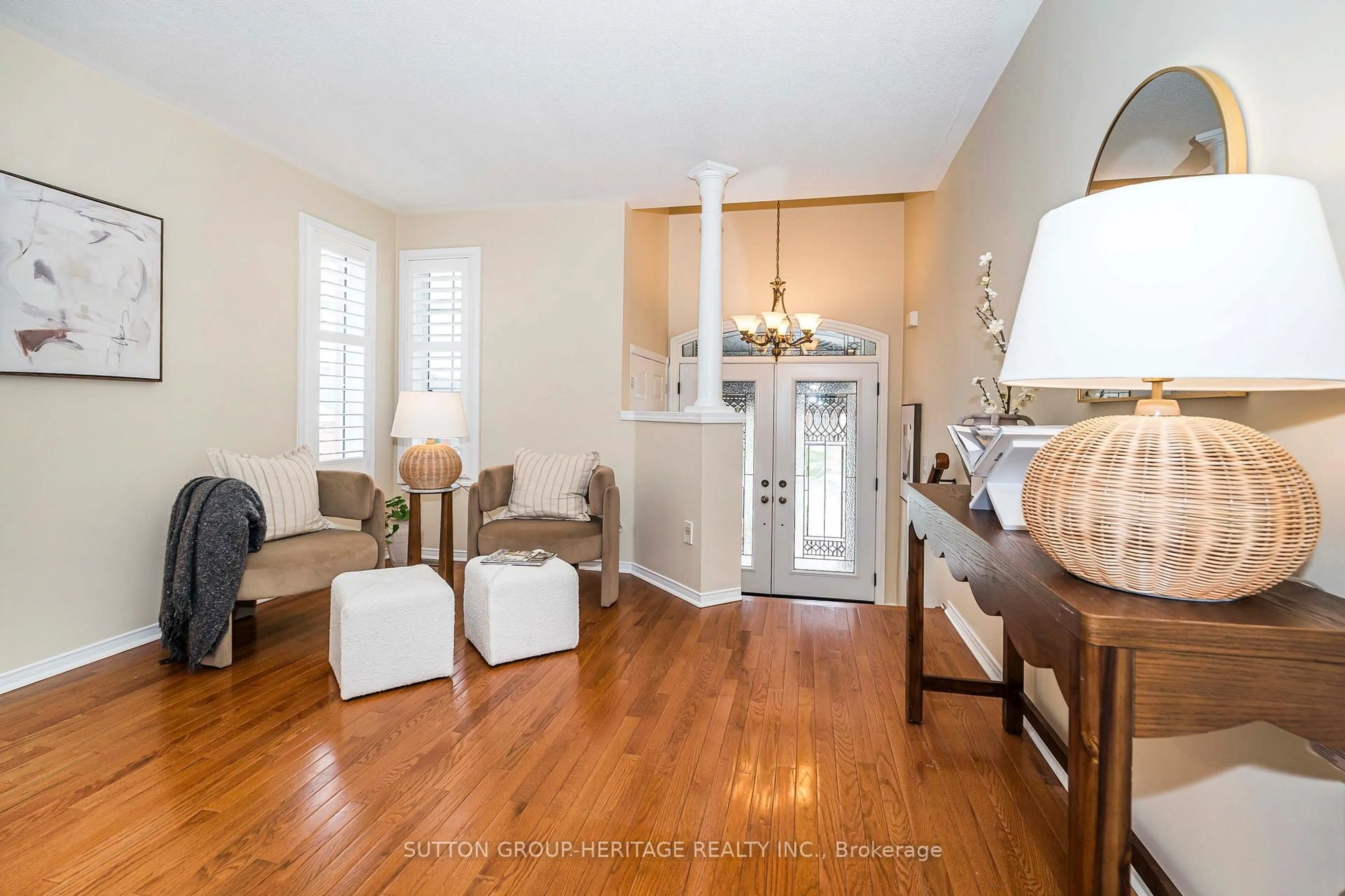 Living room with furniture, wood/laminate floor for 107 Mackey Dr, Whitby Ontario L1P 1R5