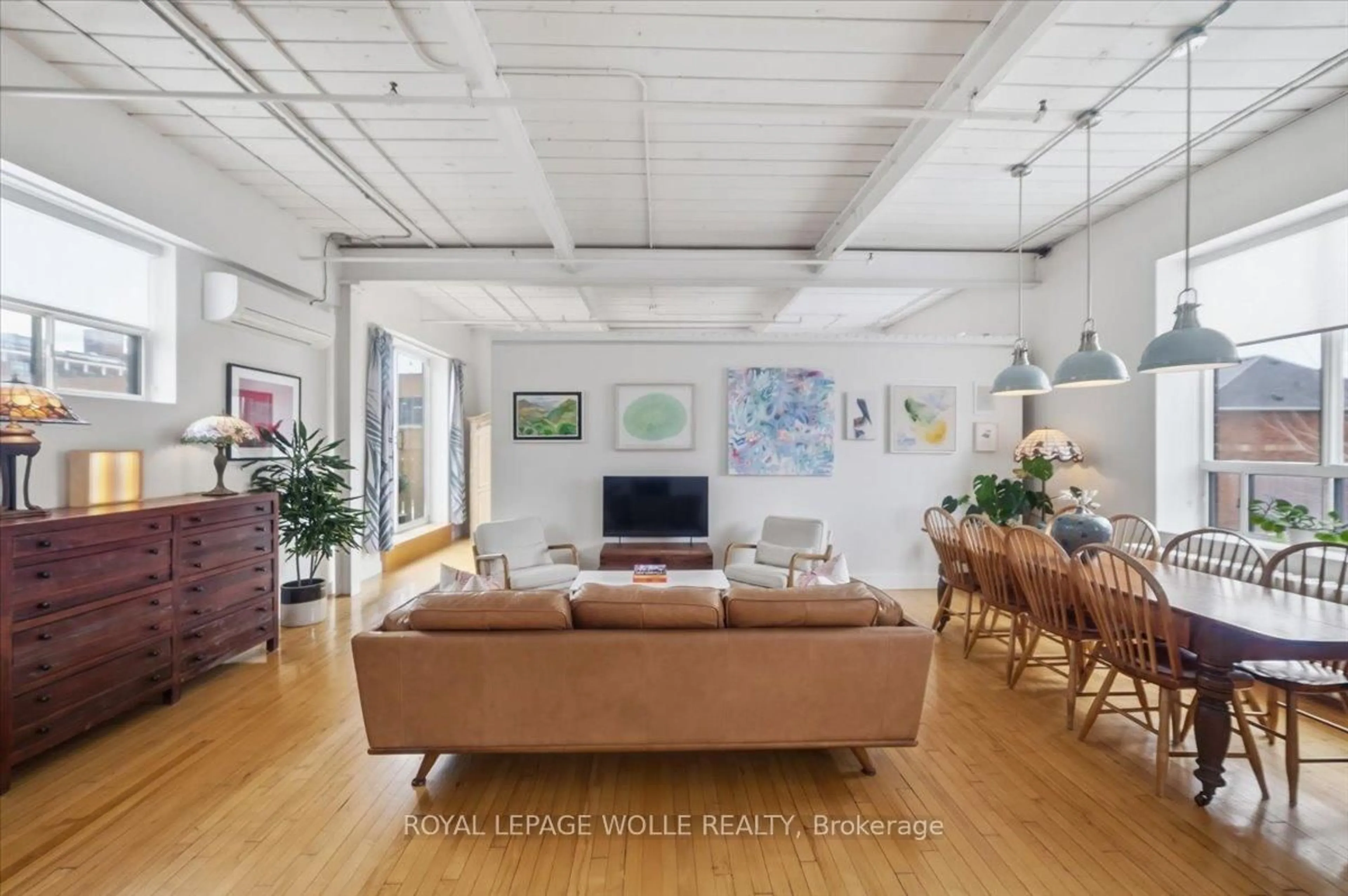 Living room with furniture, unknown for 326 Carlaw Ave #211, Toronto Ontario M4M 3N8