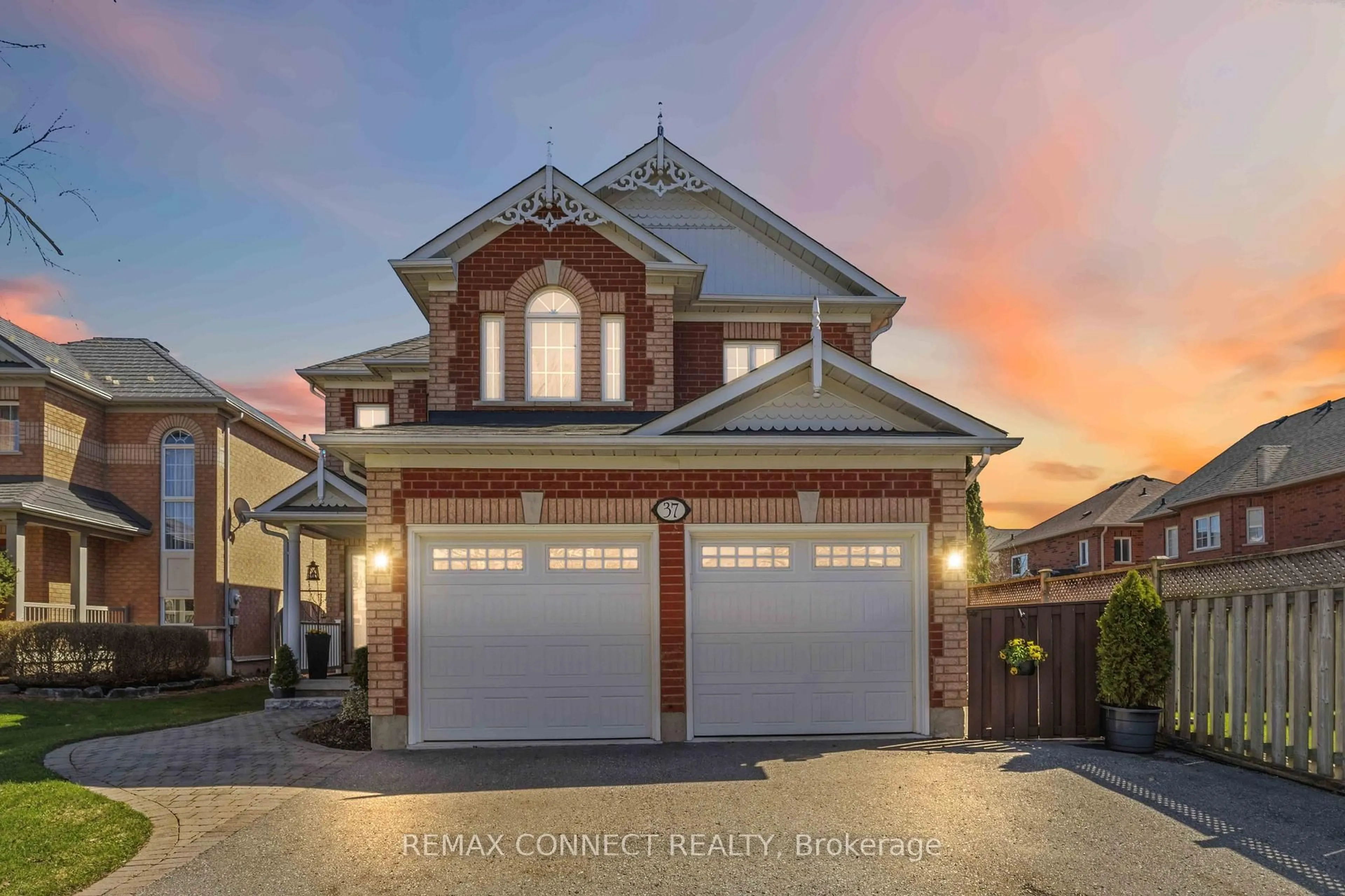 Home with brick exterior material, street for 37 Duggan Ave, Whitby Ontario L1M 1J1