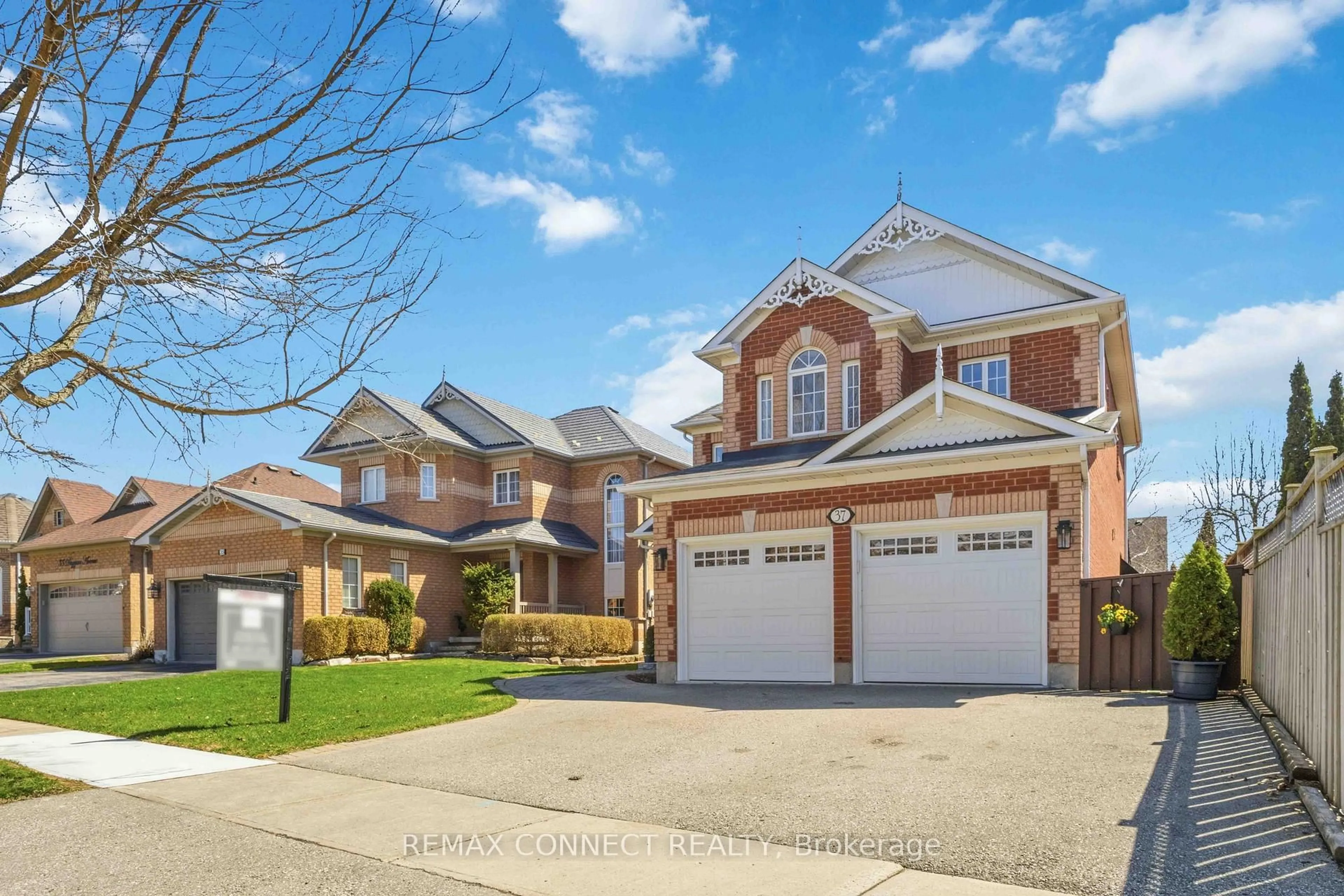 Home with brick exterior material, street for 37 Duggan Ave, Whitby Ontario L1M 1J1